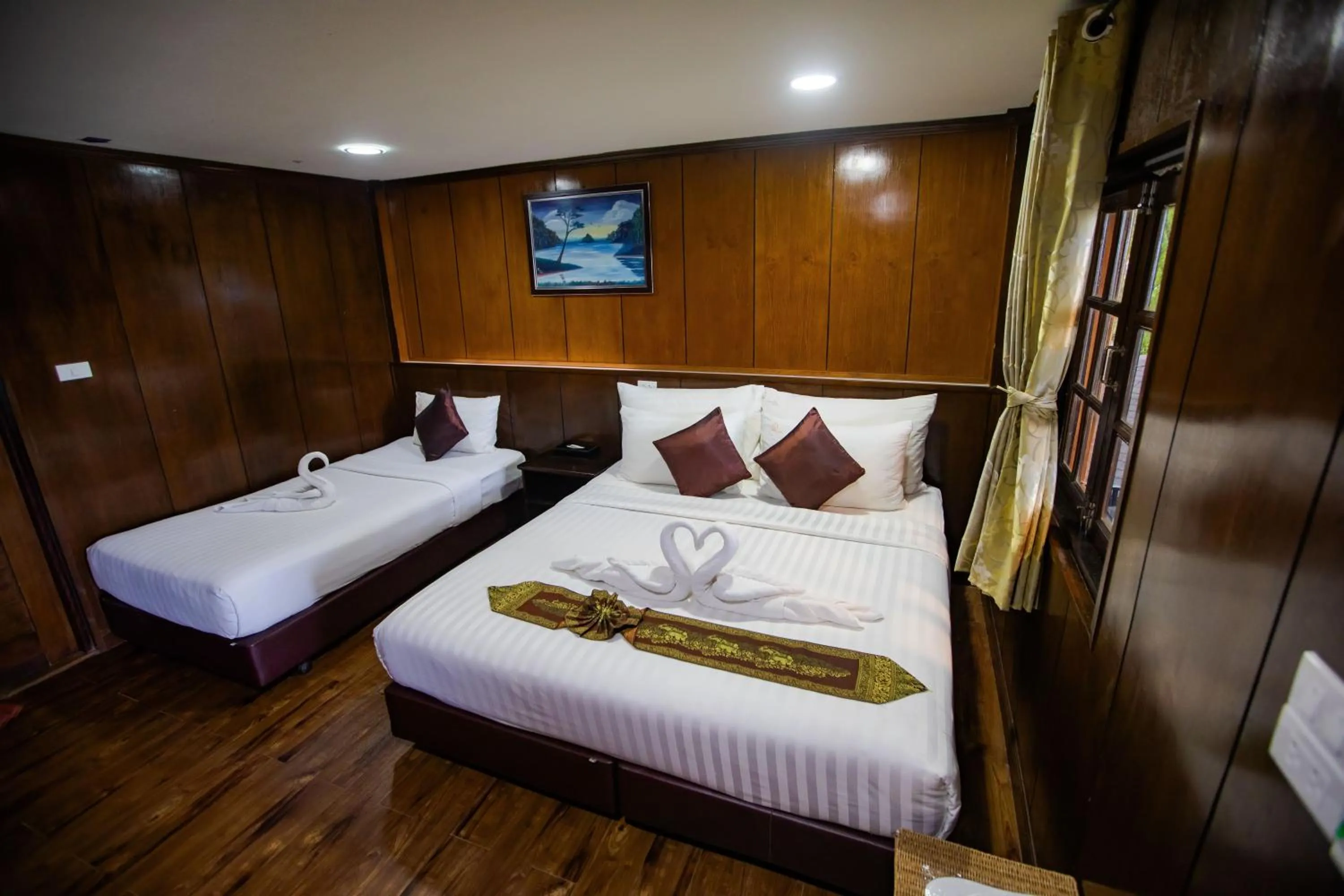 Bed in Chareena Hill Beach Resort