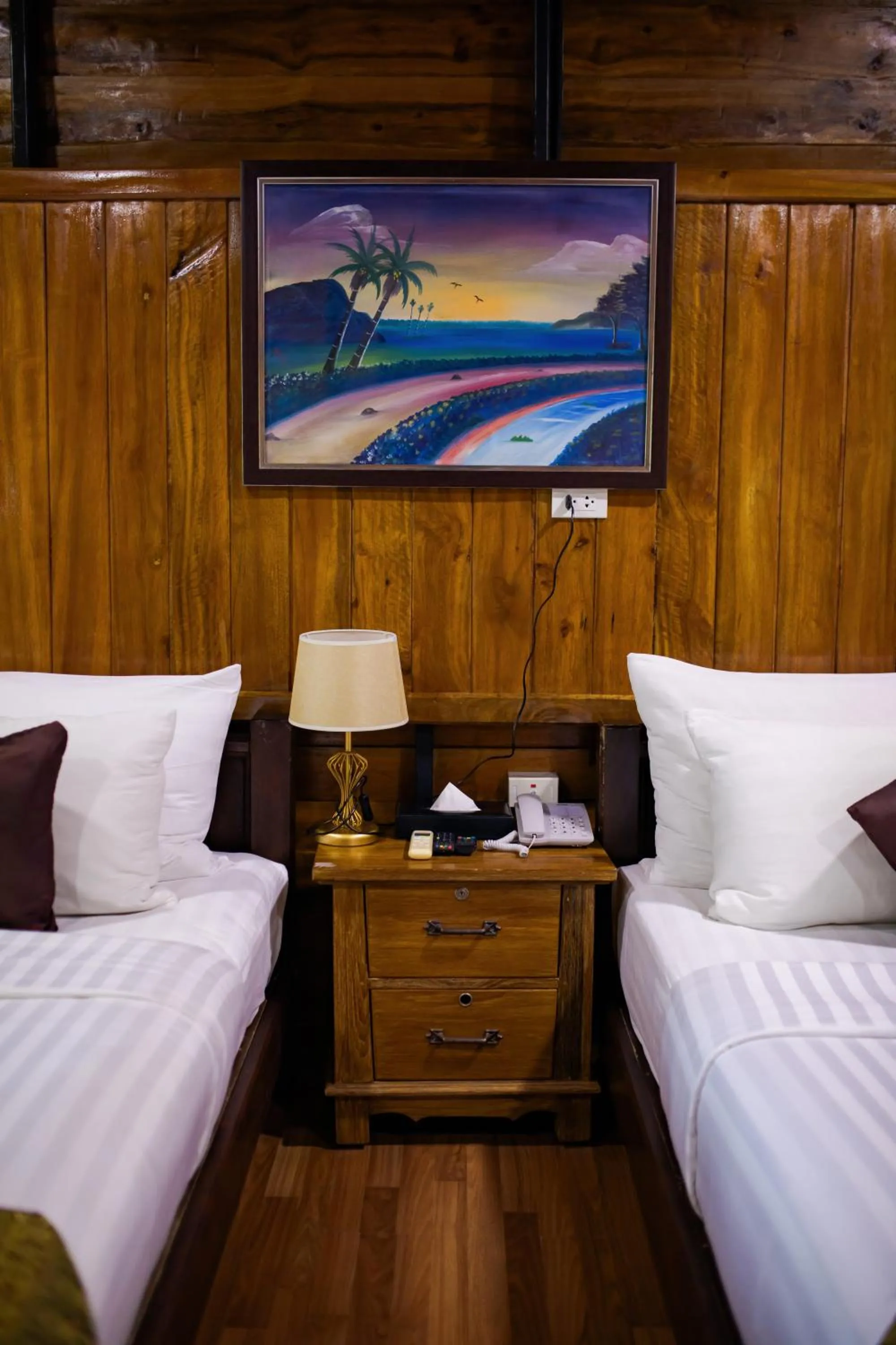 Bed in Chareena Hill Beach Resort