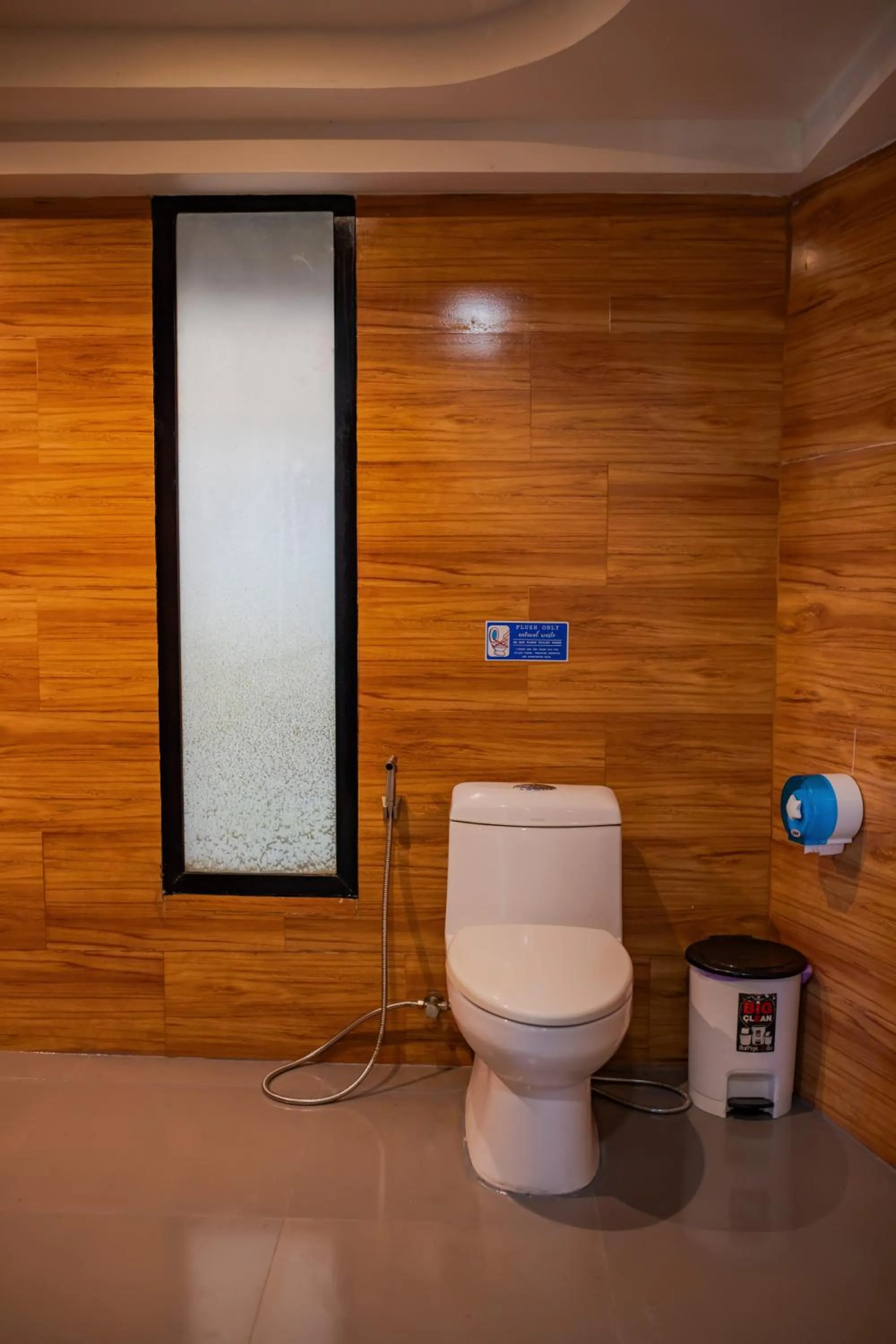 Toilet in Chareena Hill Beach Resort