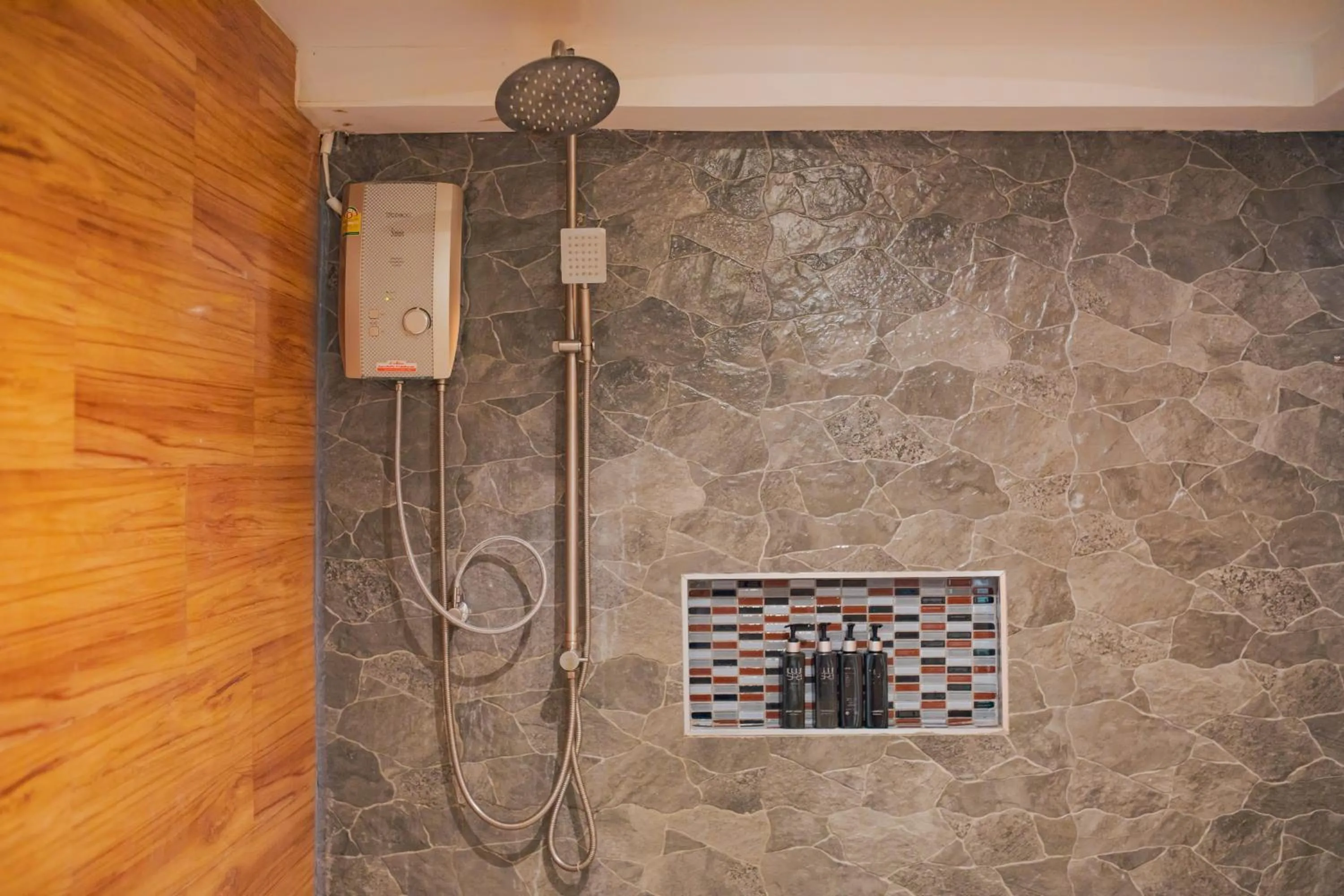 Shower in Chareena Hill Beach Resort