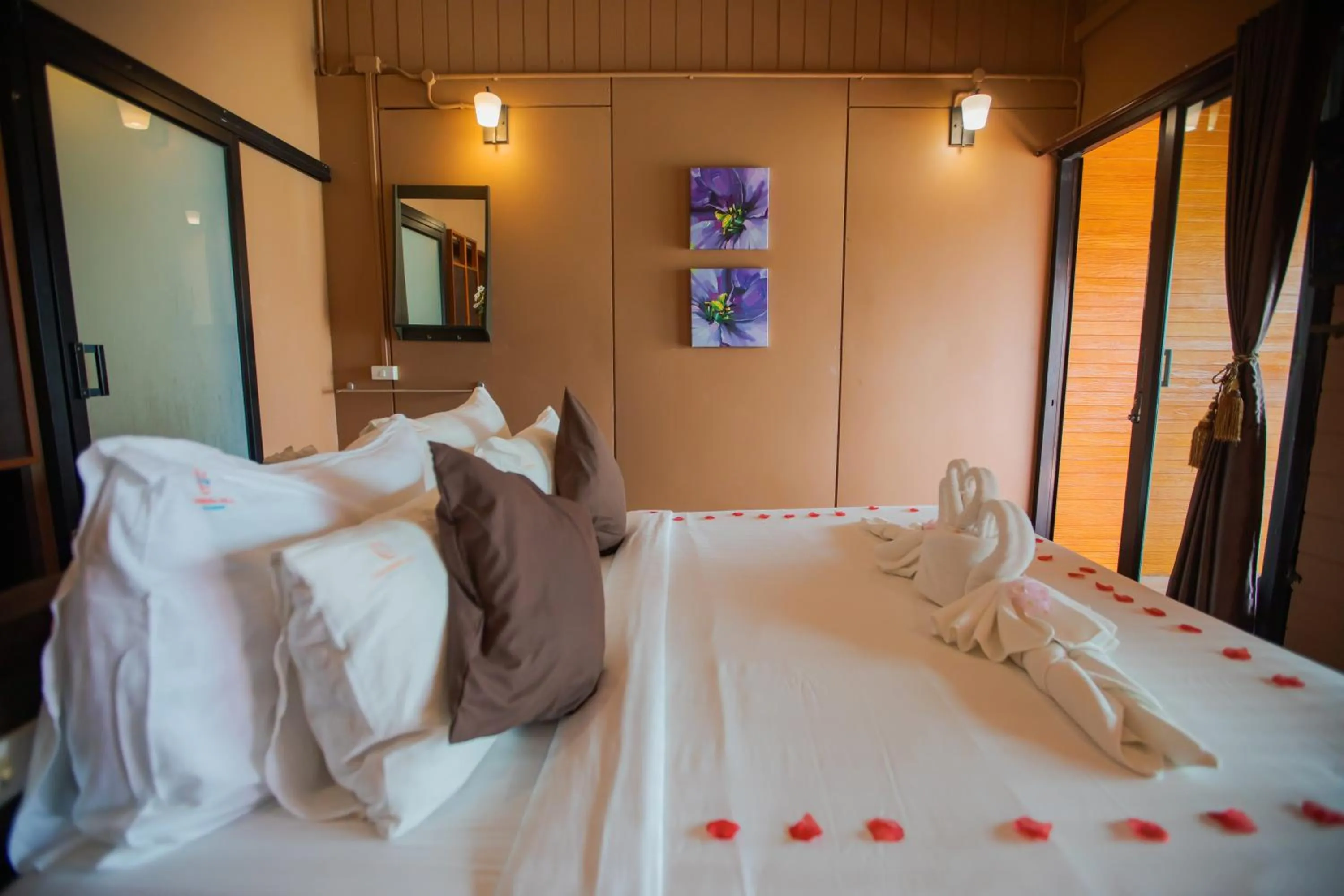 Bed in Chareena Hill Beach Resort