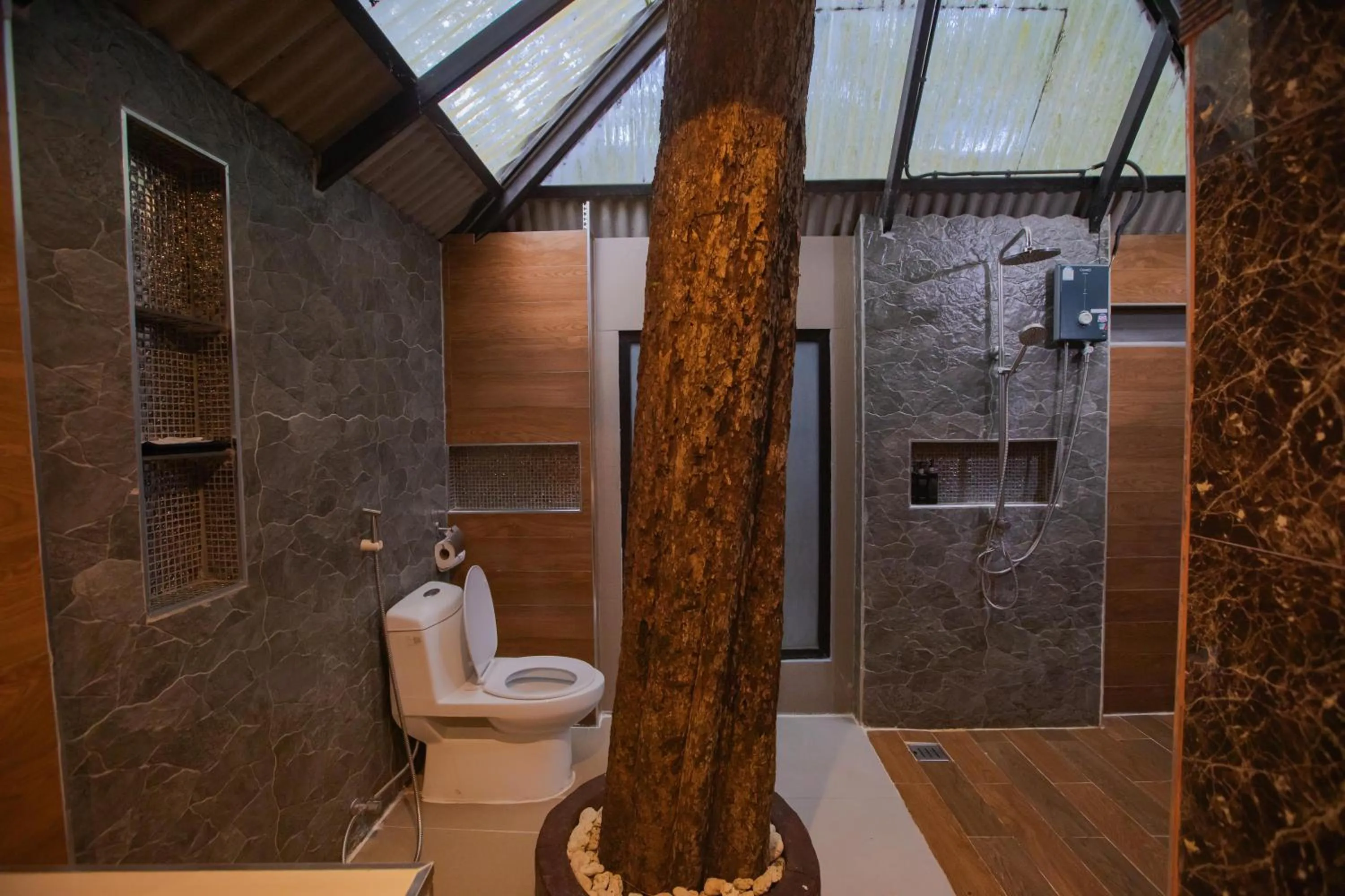 Toilet in Chareena Hill Beach Resort