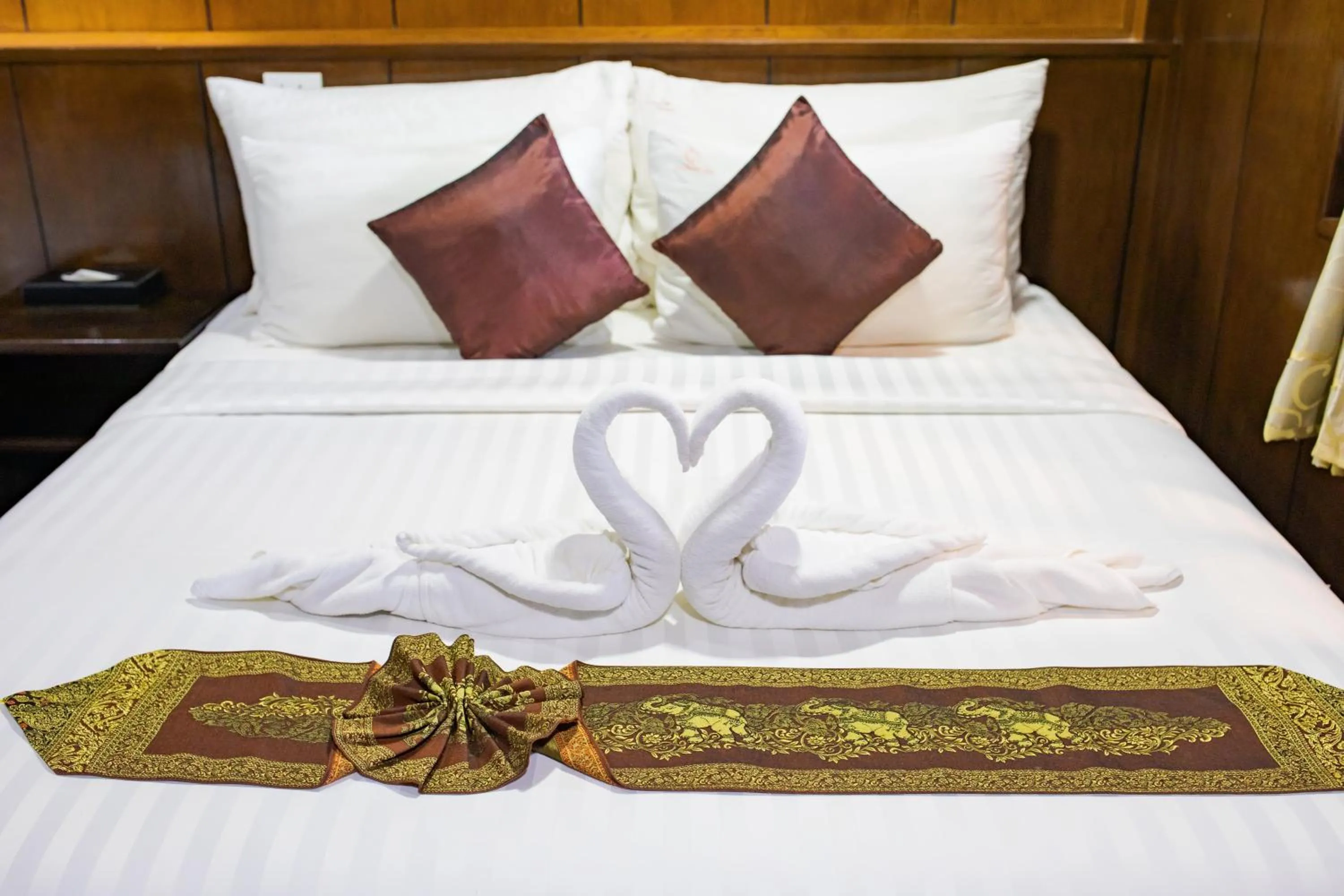 Bed in Chareena Hill Beach Resort