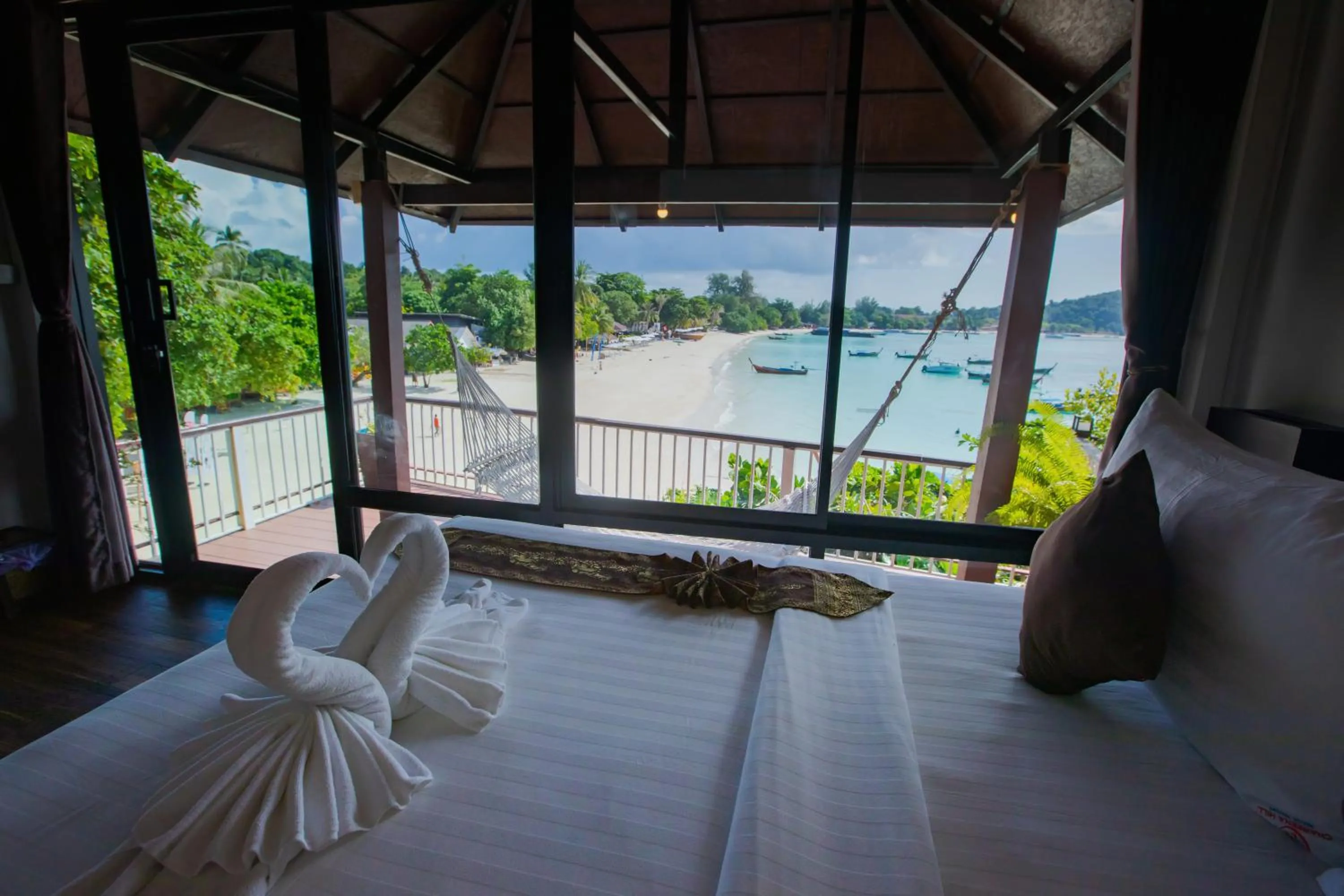 Bed in Chareena Hill Beach Resort