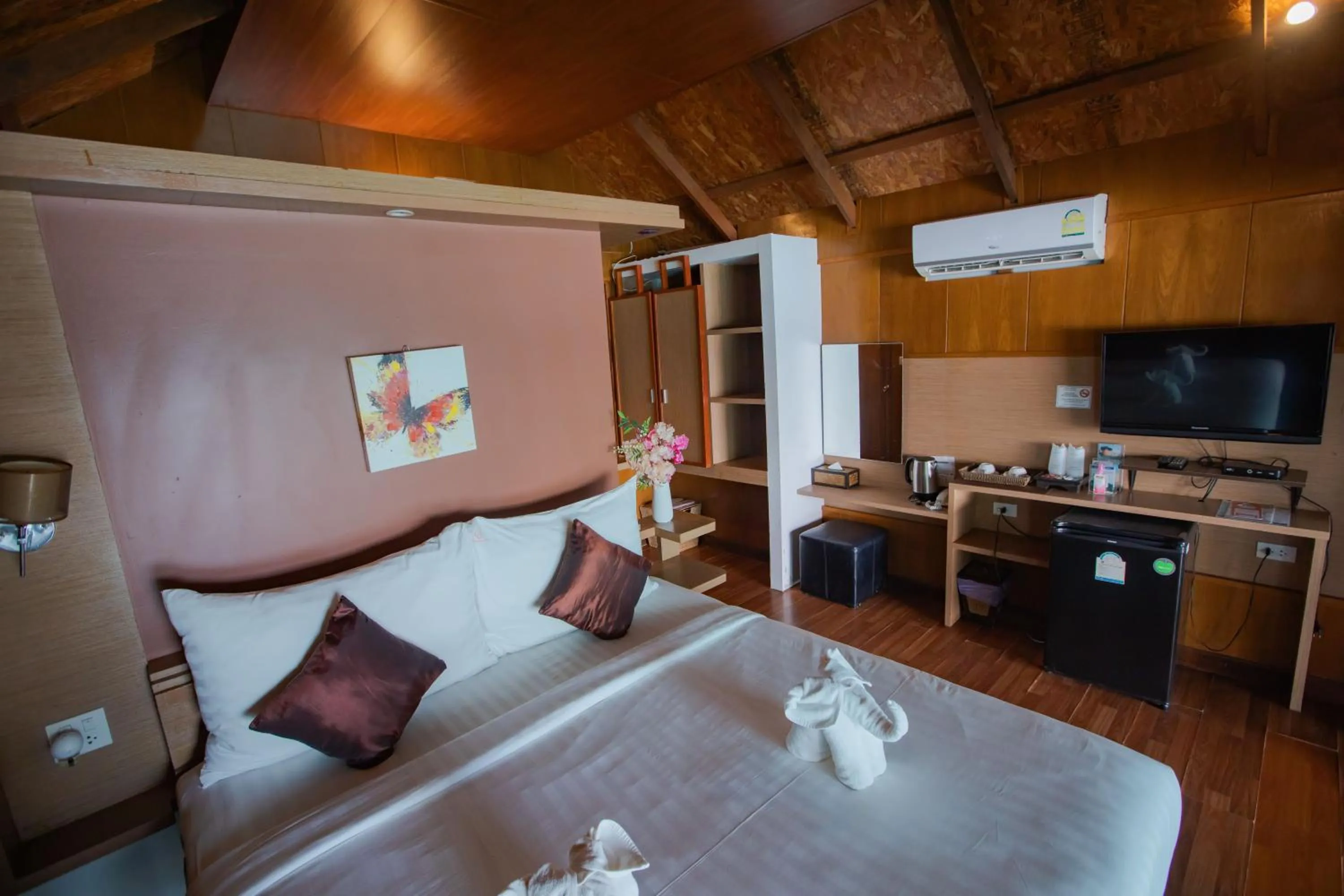 Bed in Chareena Hill Beach Resort