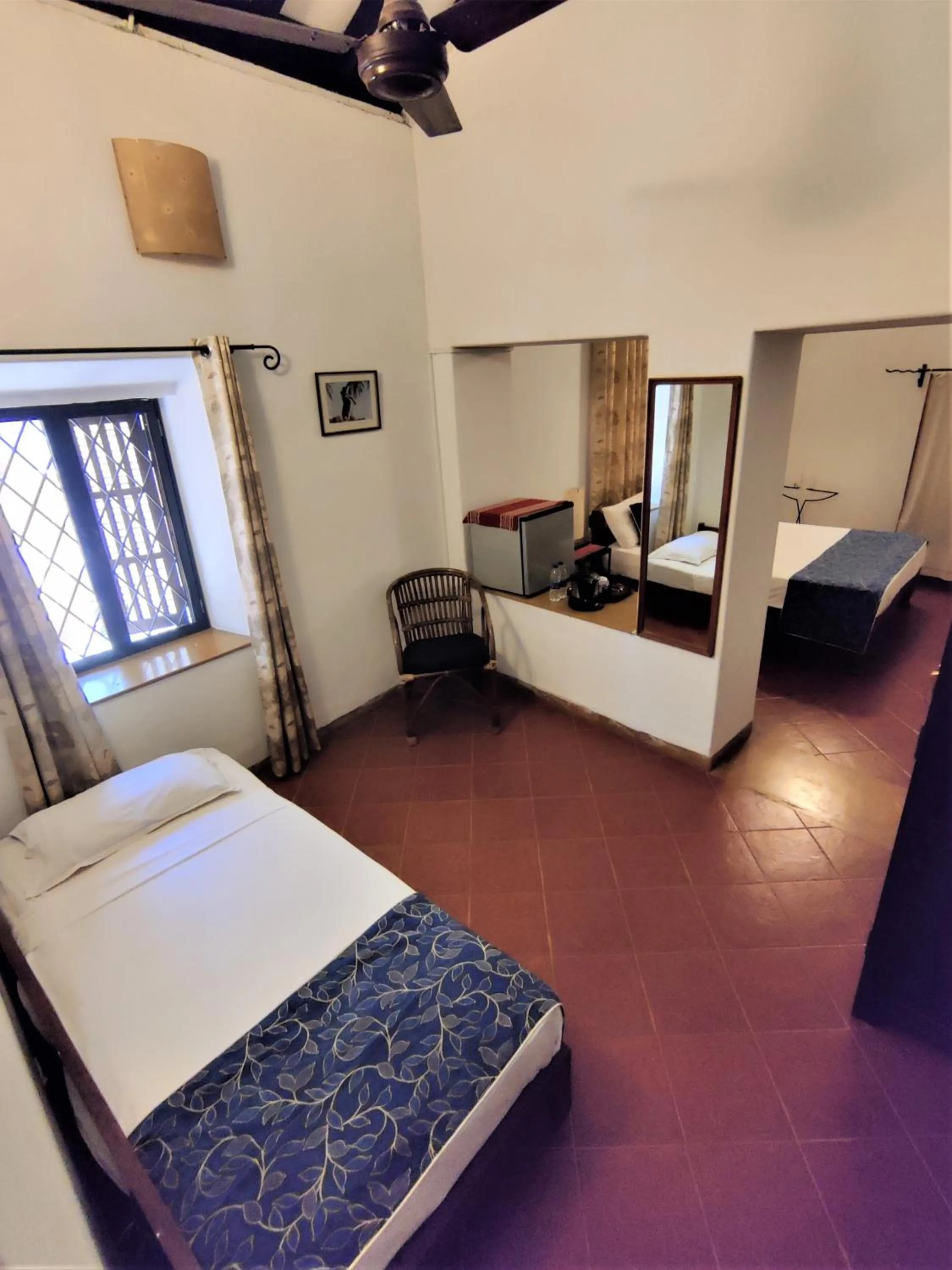 Photo of the whole room, Bed in Granpa's Inn Hotel Bougainvillea