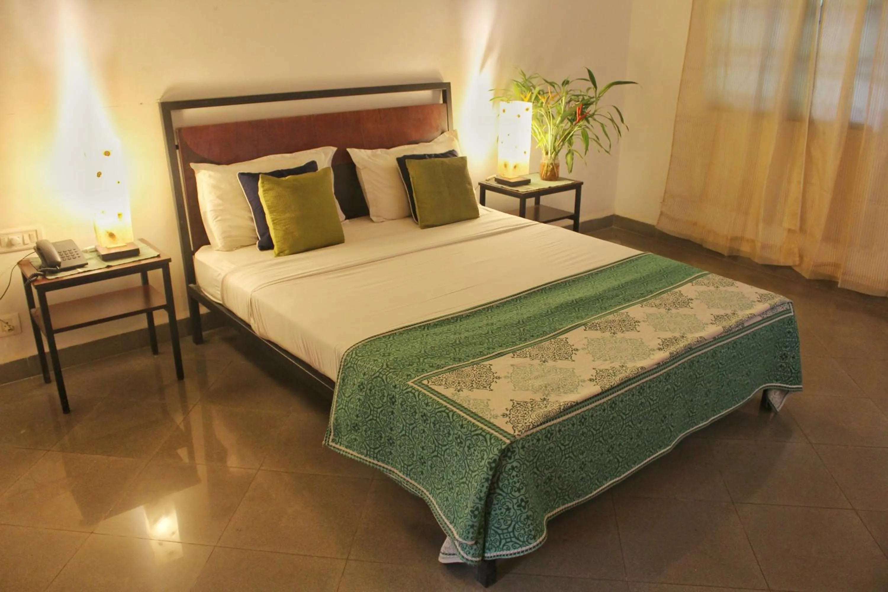 Bed in Granpa's Inn Hotel Bougainvillea