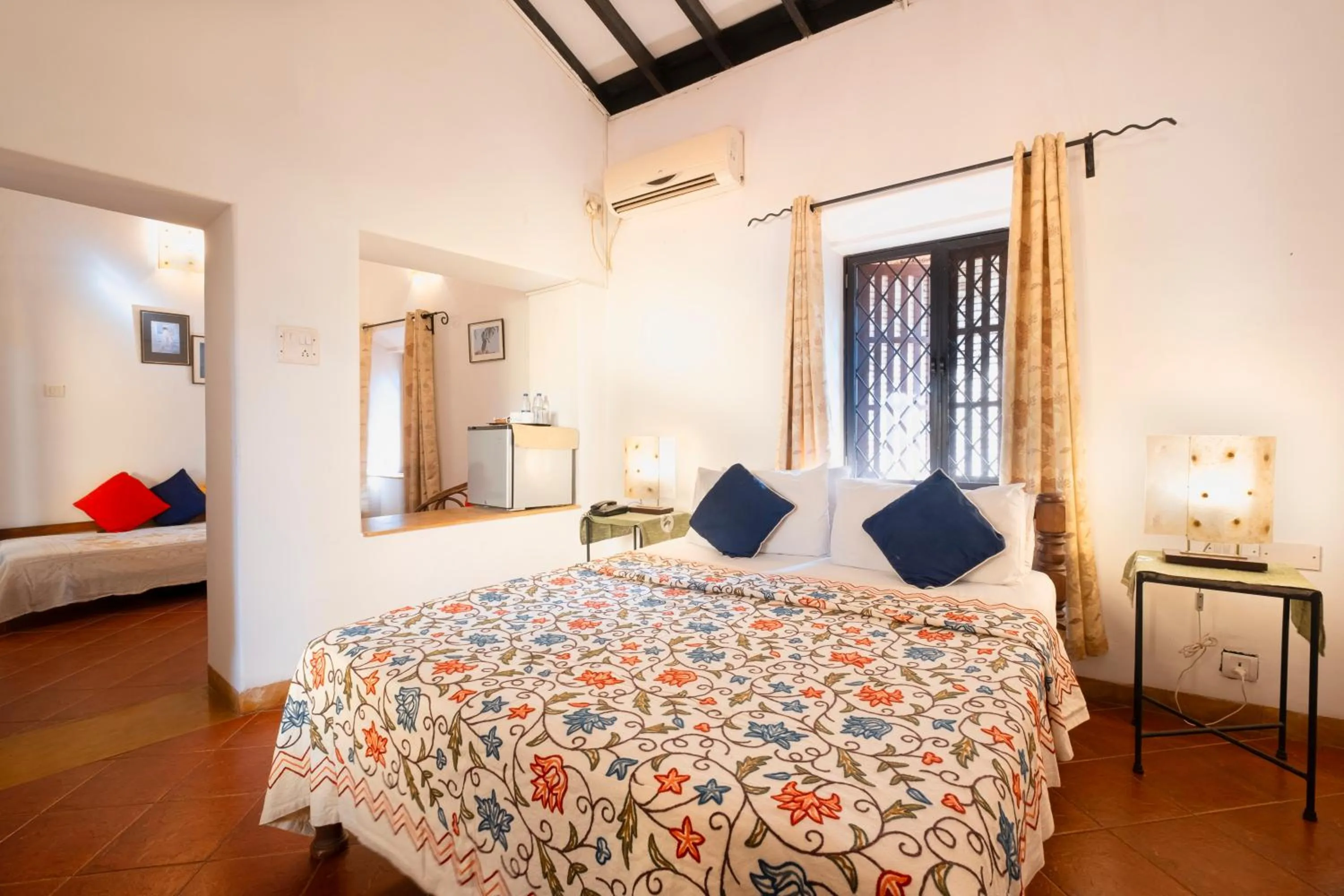 Bed in Granpa's Inn Hotel Bougainvillea