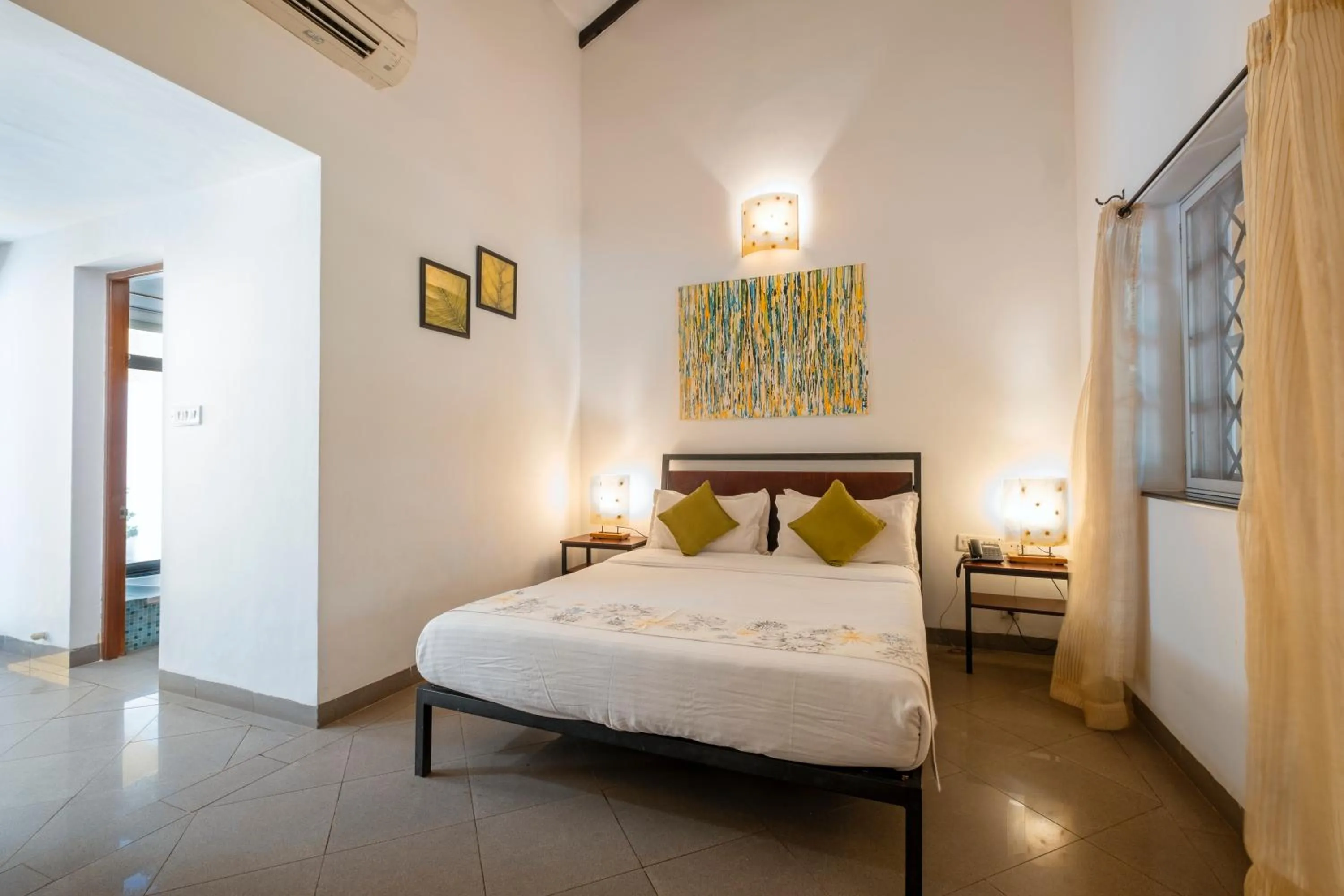 Bed in Granpa's Inn Hotel Bougainvillea