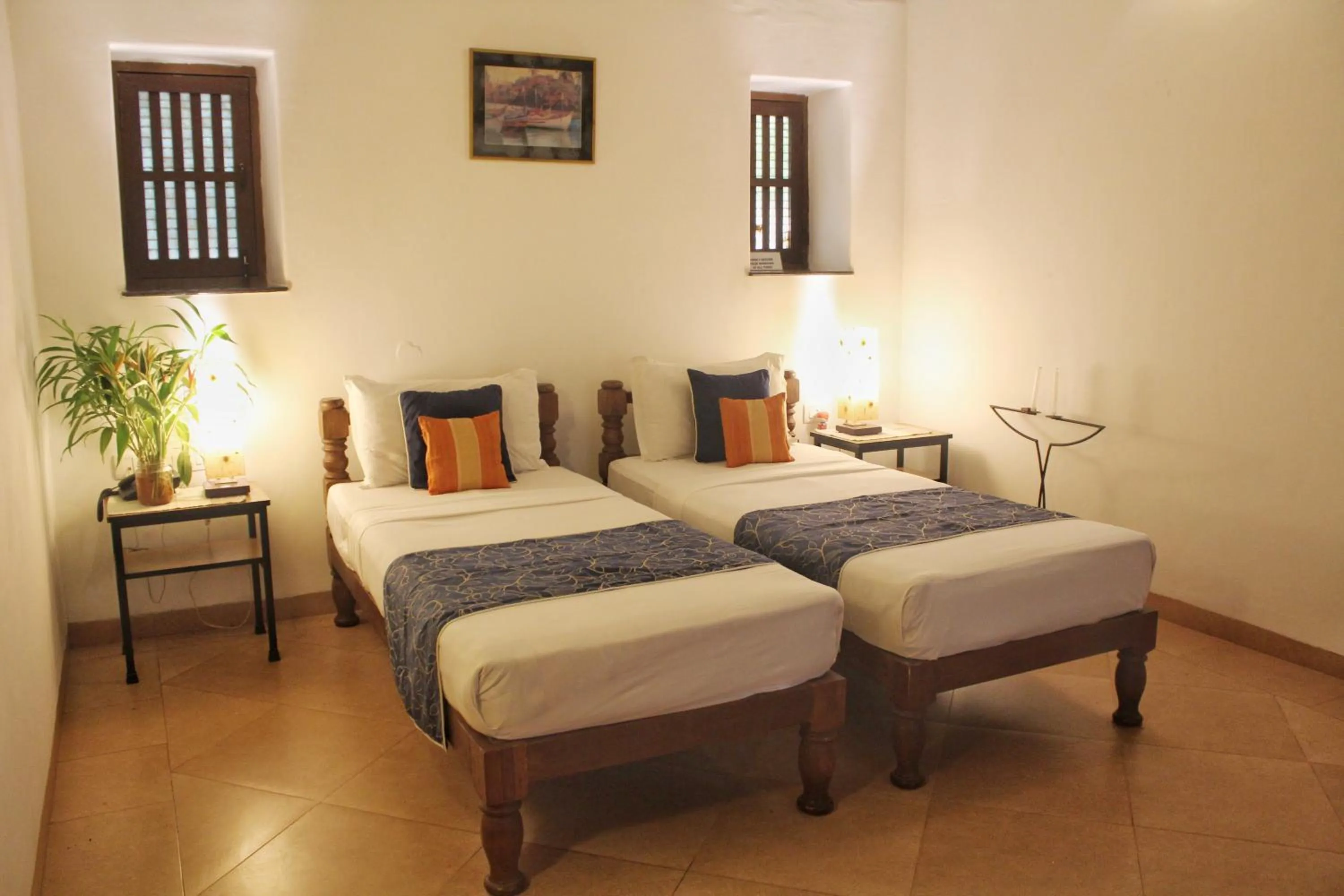 Bed in Granpa's Inn Hotel Bougainvillea