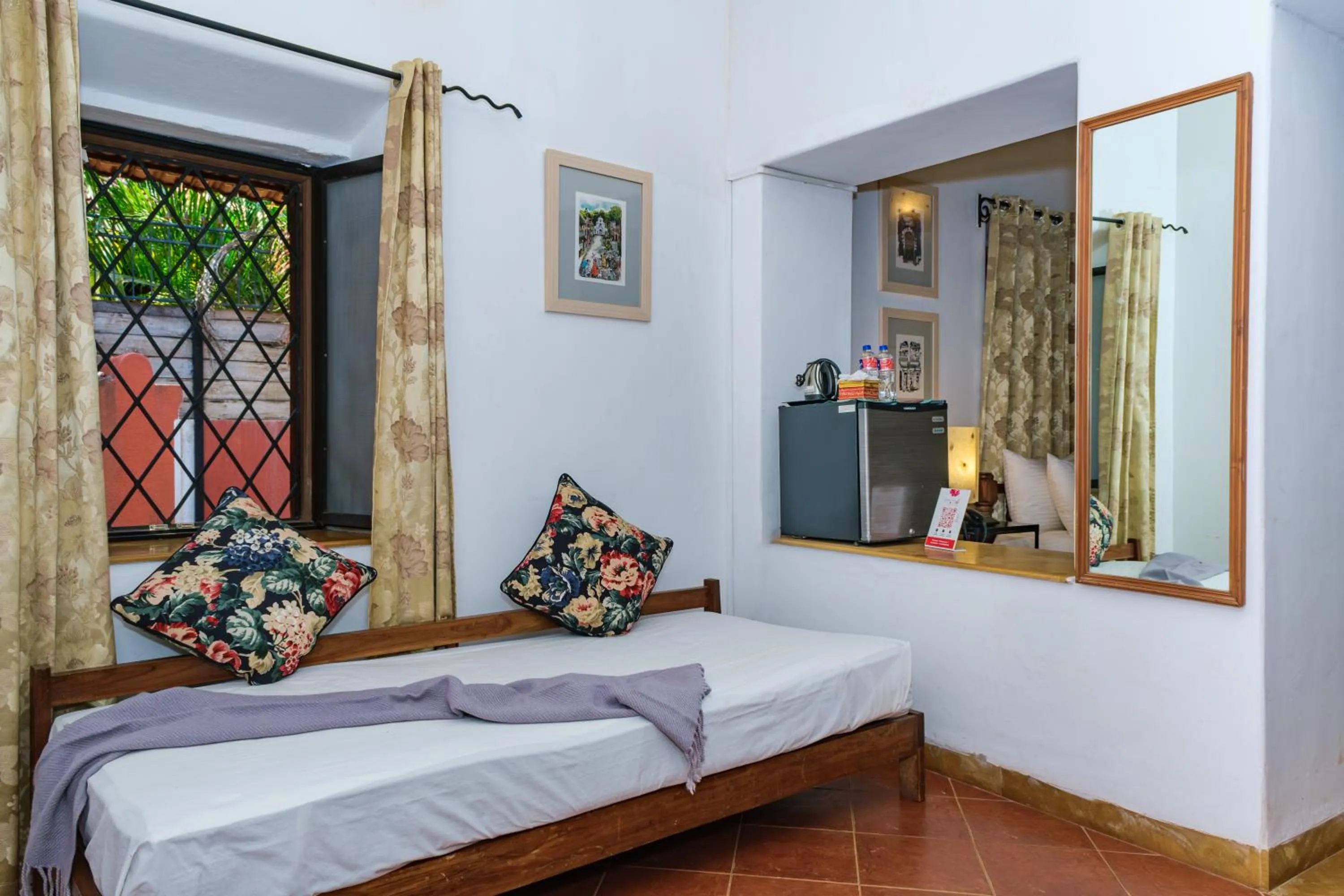 Bed in Granpa's Inn Hotel Bougainvillea