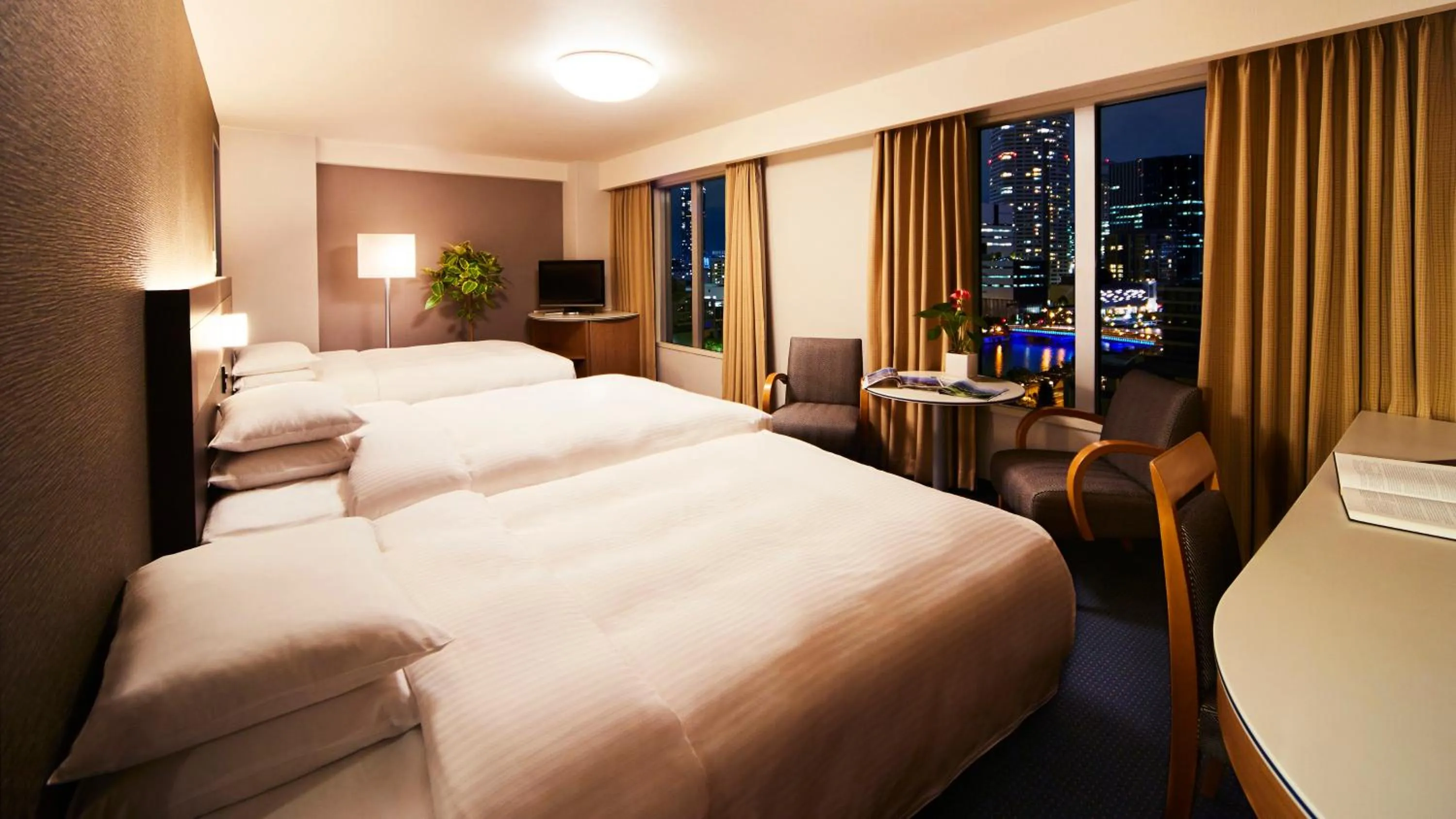 Photo of the whole room, Bed in RIHGA Royal Hotel Osaka, Vignette Collection by IHG