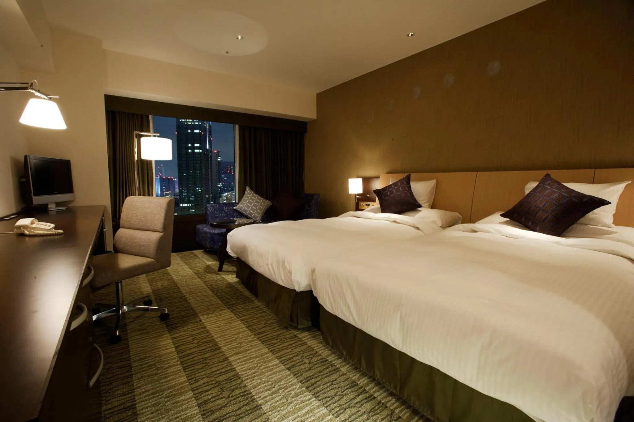 Photo of the whole room, Bed in RIHGA Royal Hotel Osaka, Vignette Collection by IHG