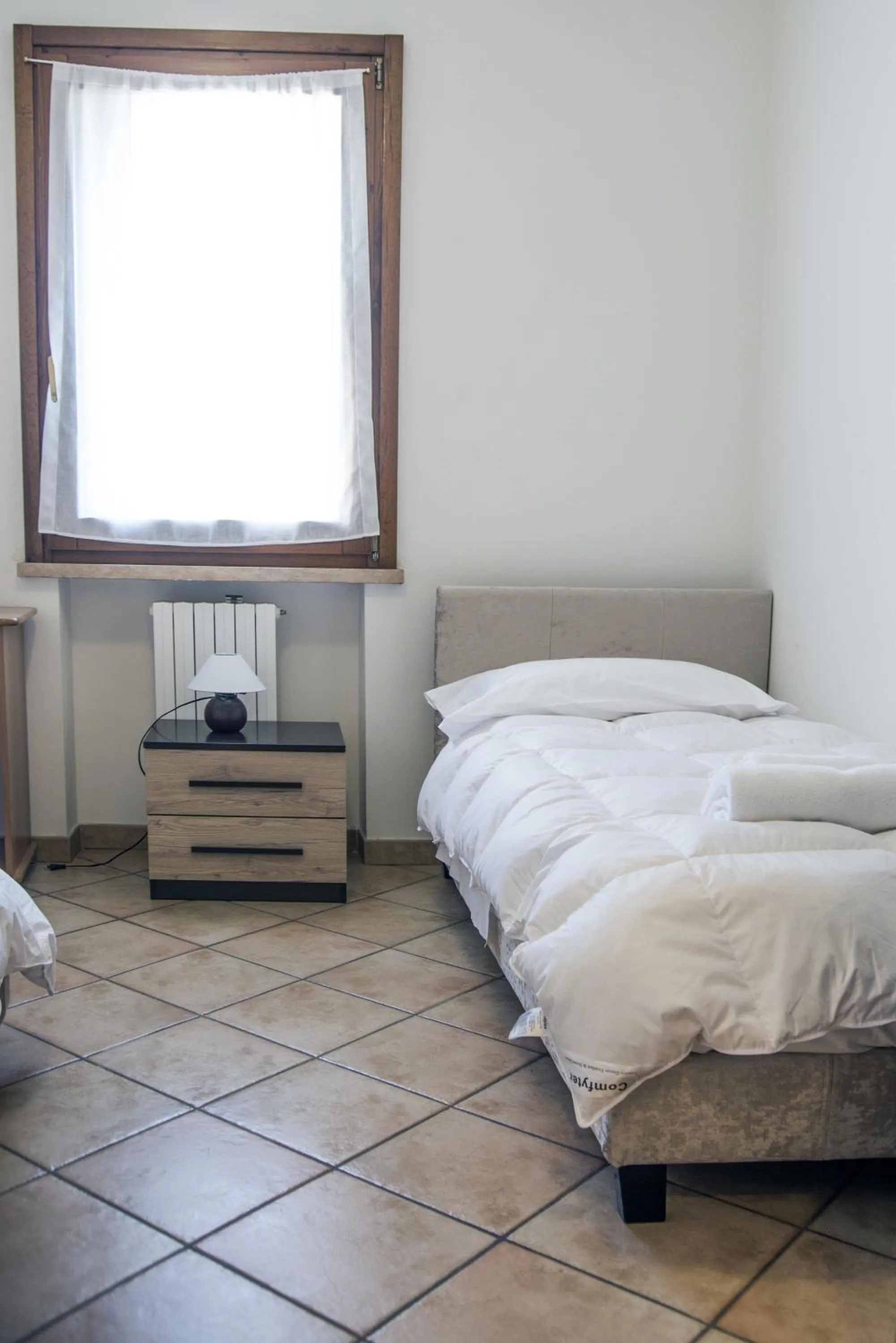 Photo of the whole room, Bed in Residenza Meeting