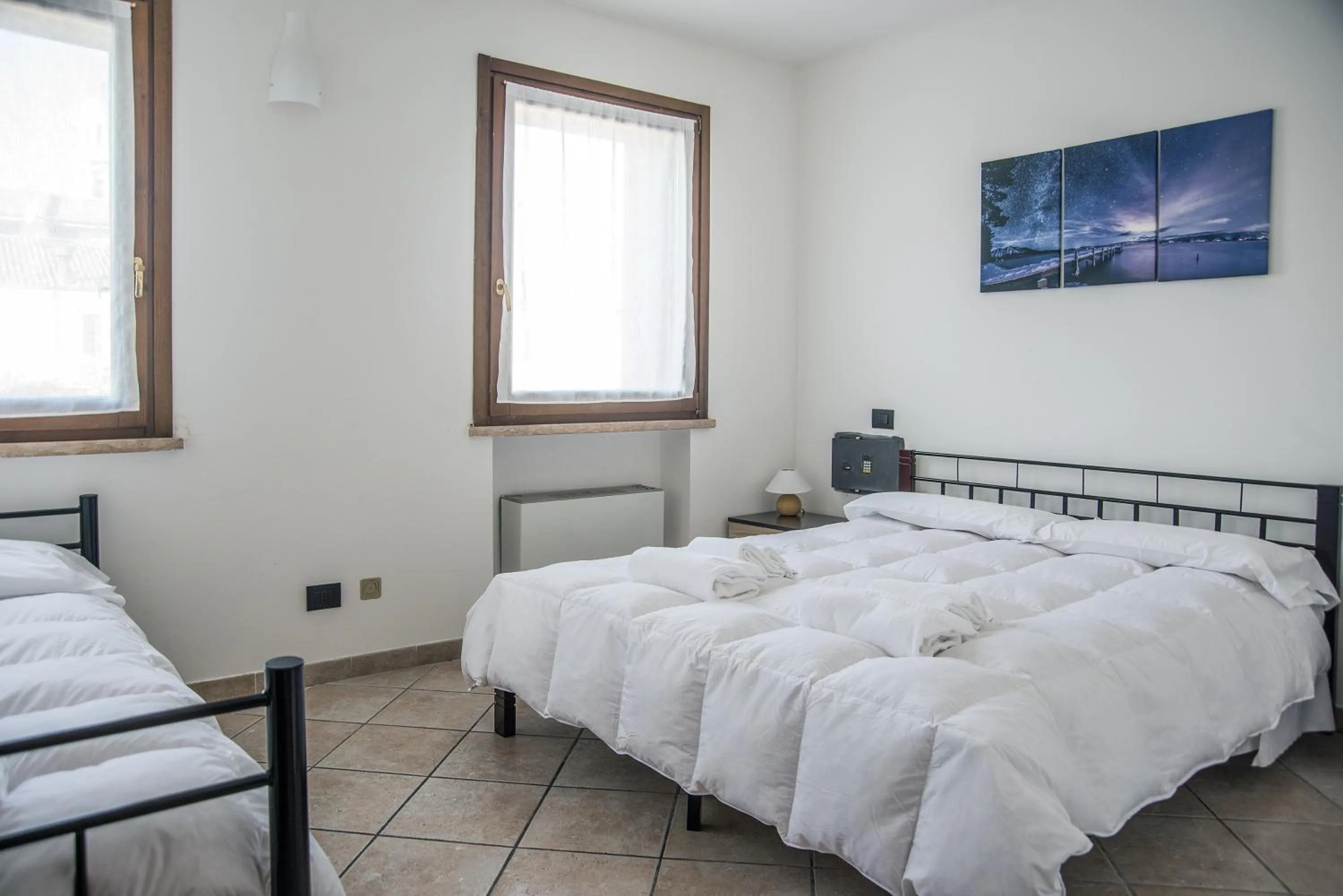 Photo of the whole room, Bed in Residenza Meeting