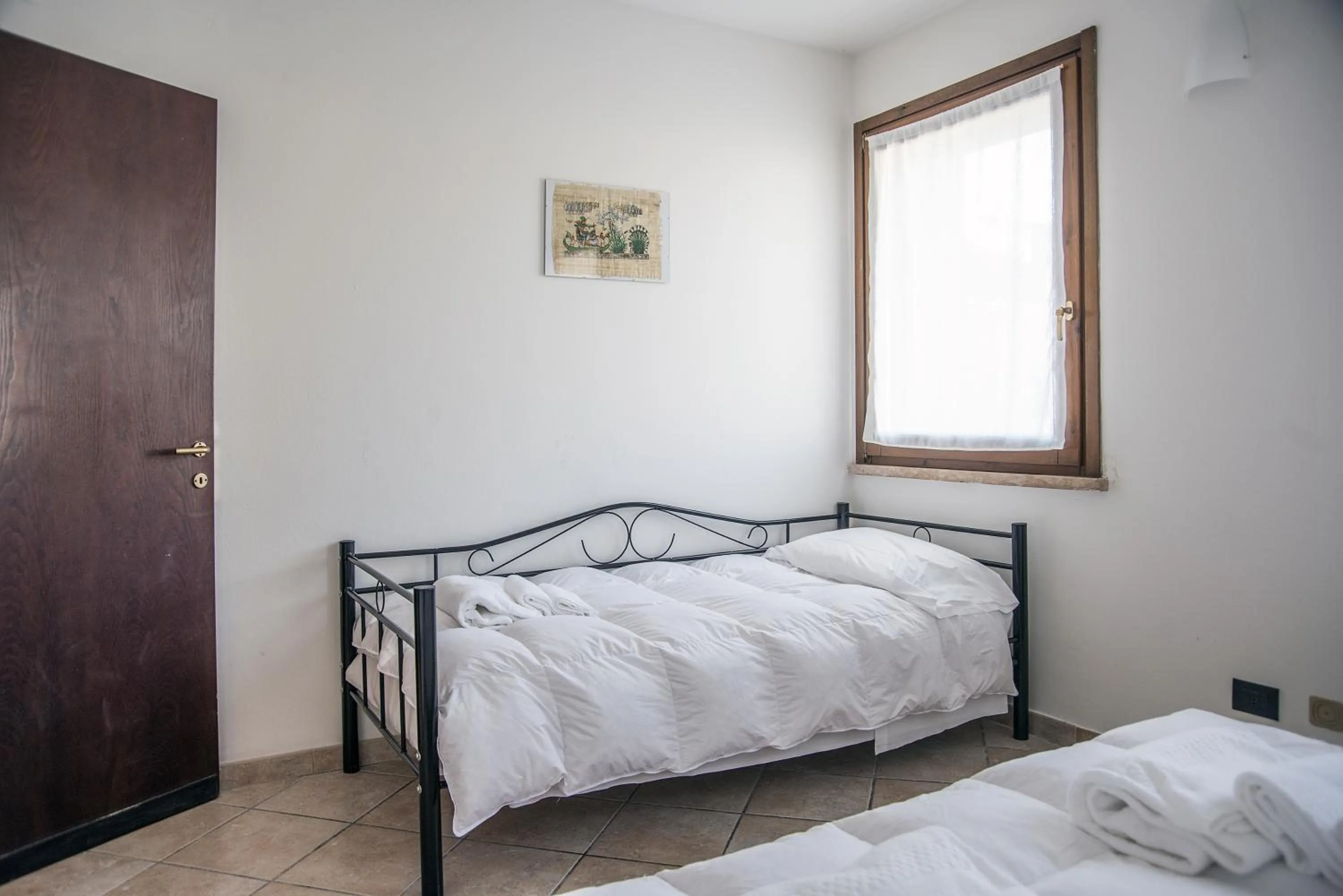 Photo of the whole room, Bed in Residenza Meeting