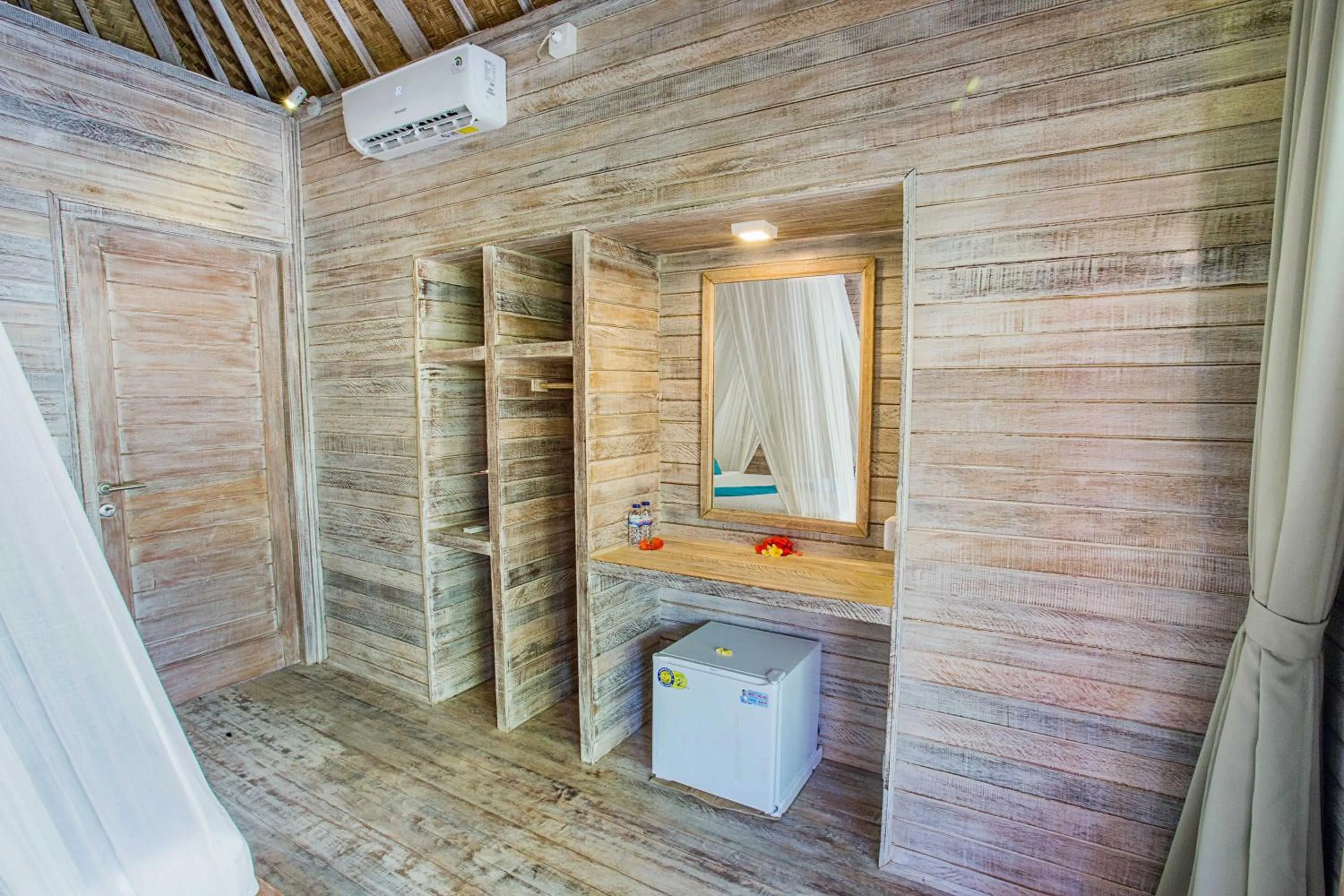 Bedroom in Lotus Garden Huts