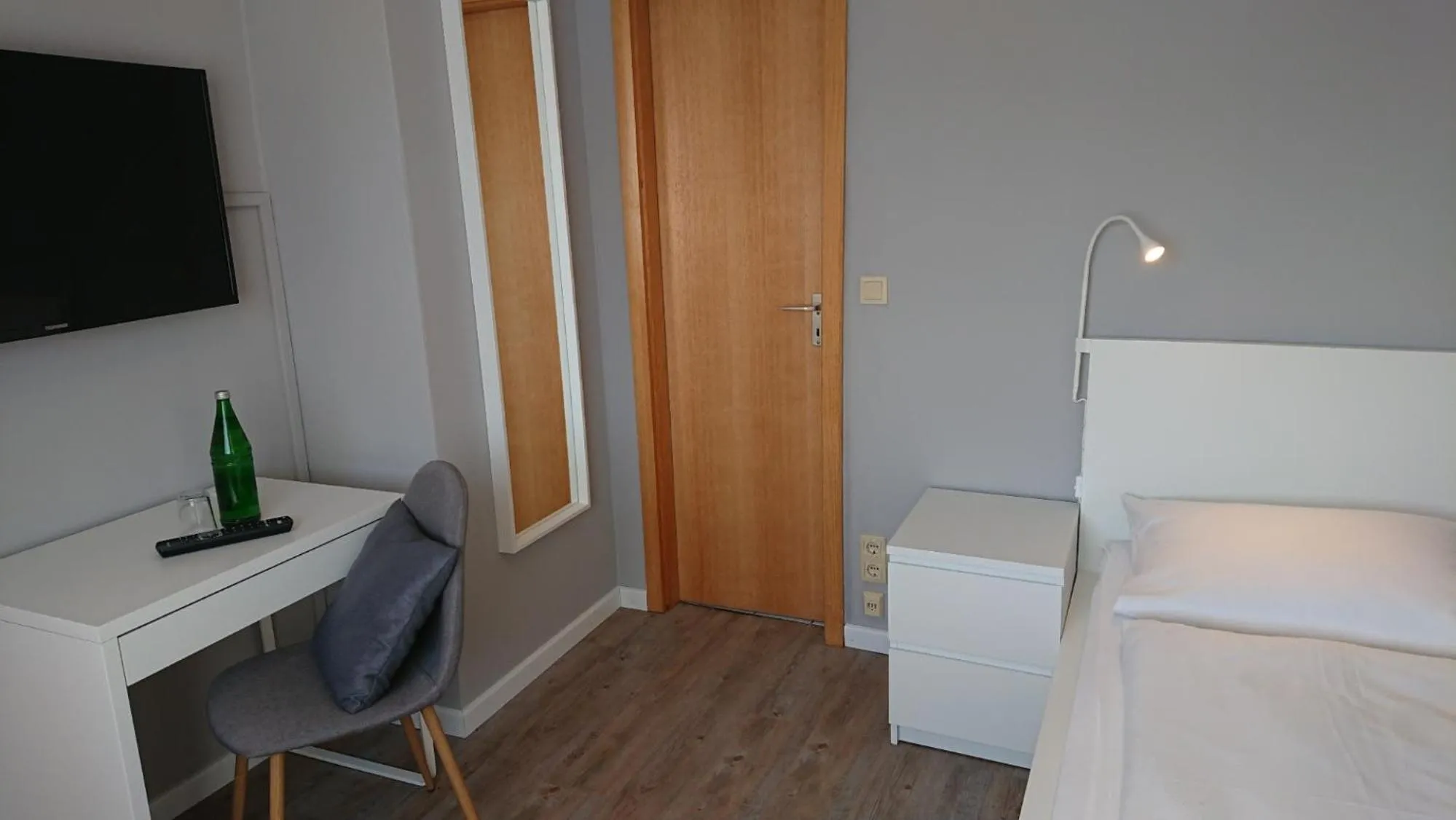 Seating area, Bed in Ostseehotel Kappeln by team SchleiFee