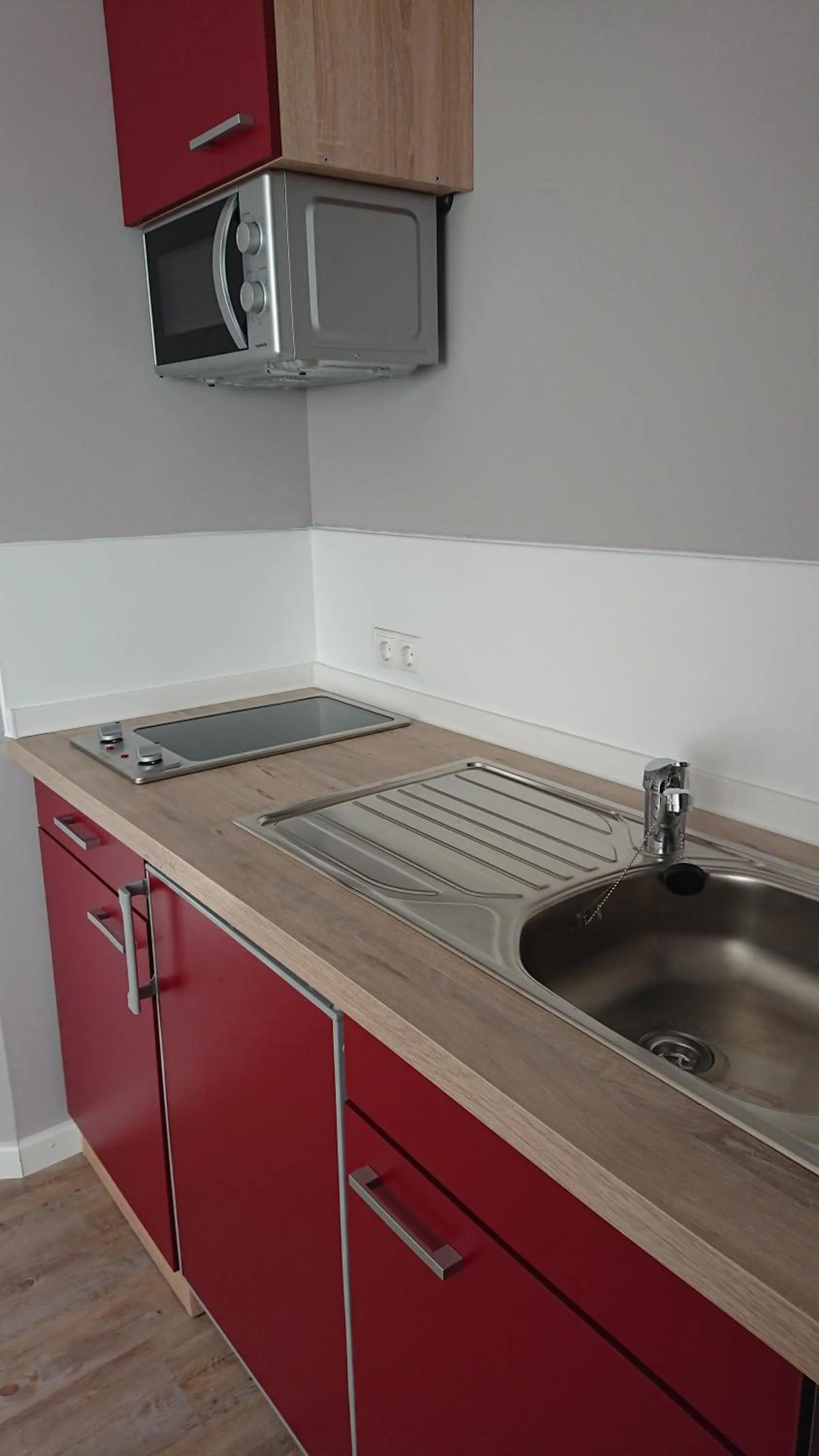 Kitchen or kitchenette in Ostseehotel Kappeln by team SchleiFee