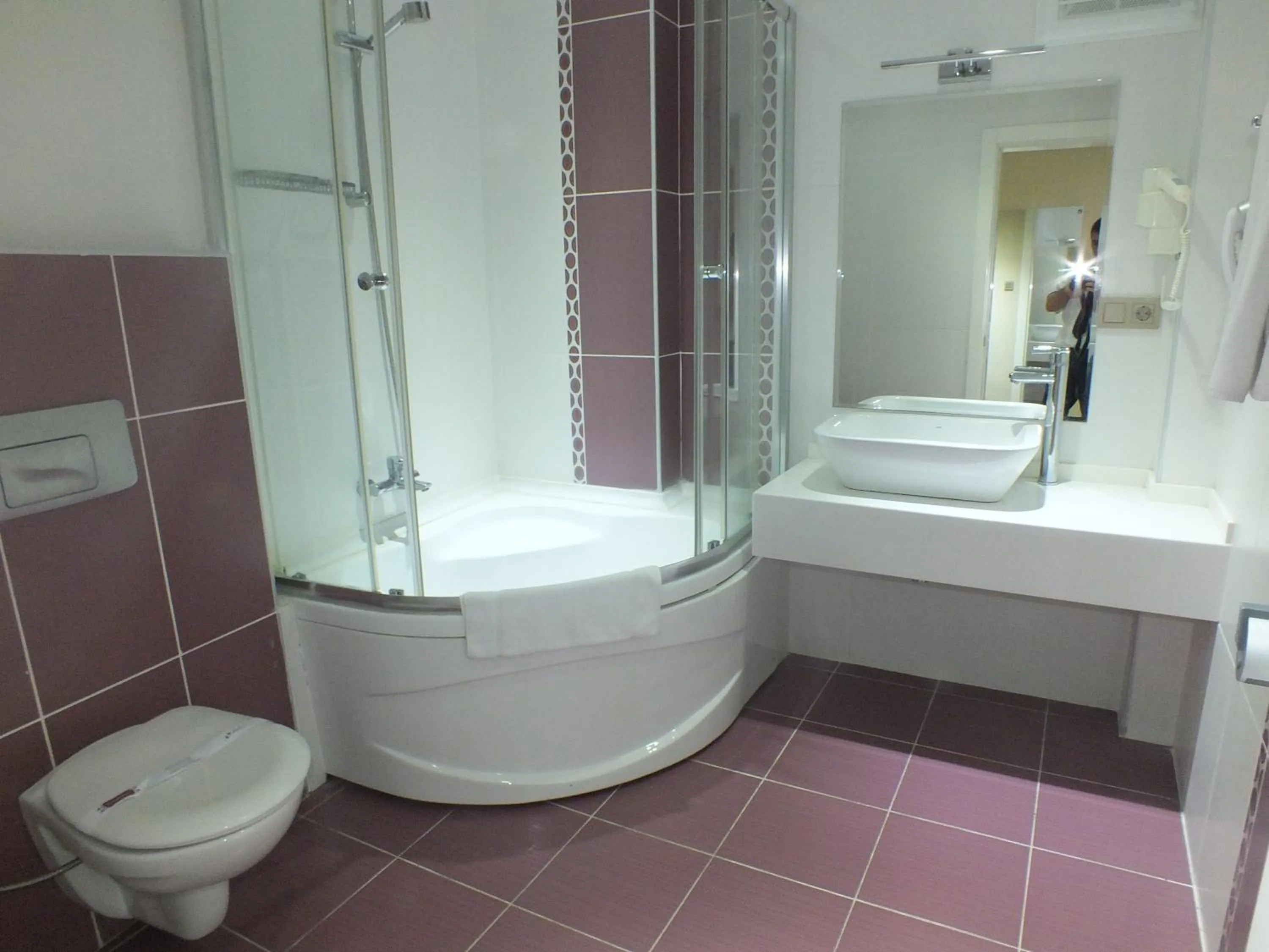 Bathroom in Grand Ahos Hotel