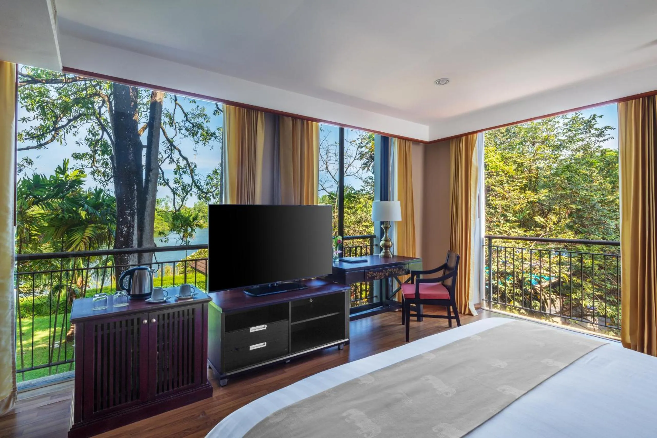 Bed in Tawa Ravadee Resort Prachinburi, a member of WorldHotels Distinctive