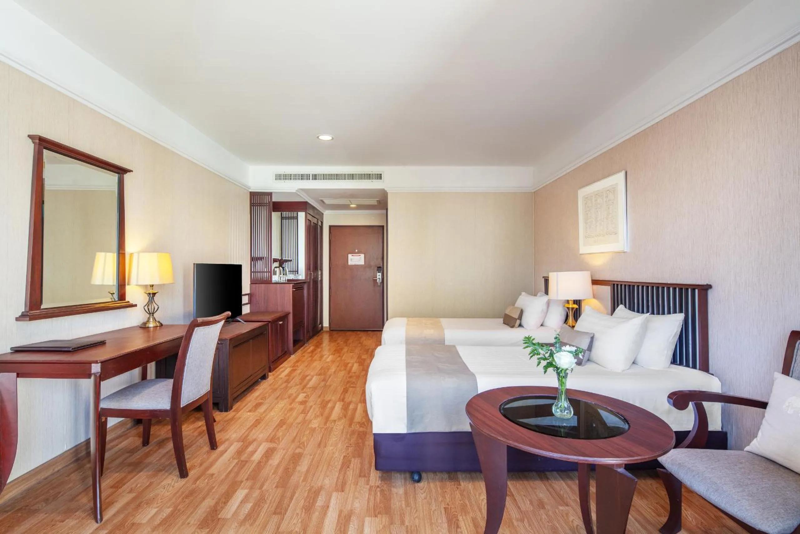 Bed in Tawa Ravadee Resort Prachinburi, a member of WorldHotels Distinctive