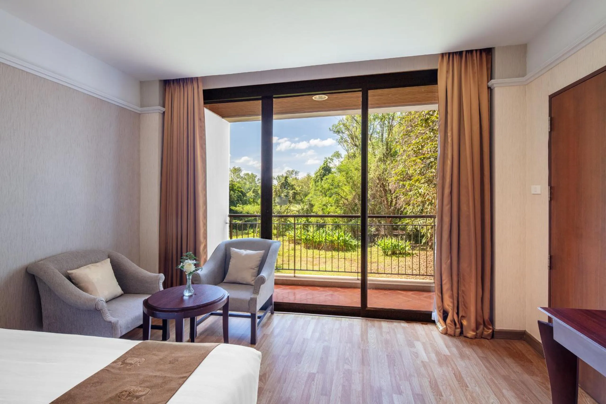 Bed in Tawa Ravadee Resort Prachinburi, a member of WorldHotels Distinctive