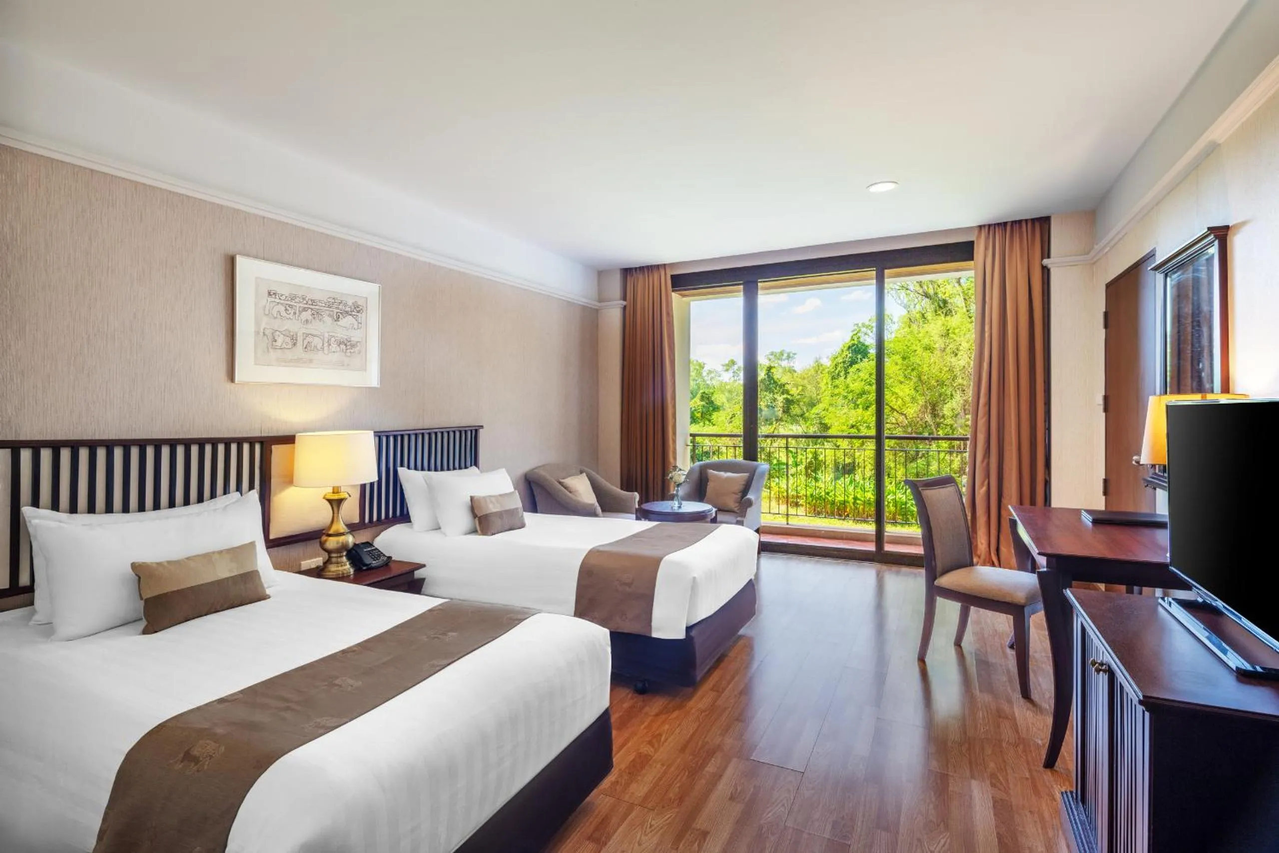Bed in Tawa Ravadee Resort Prachinburi, a member of WorldHotels Distinctive