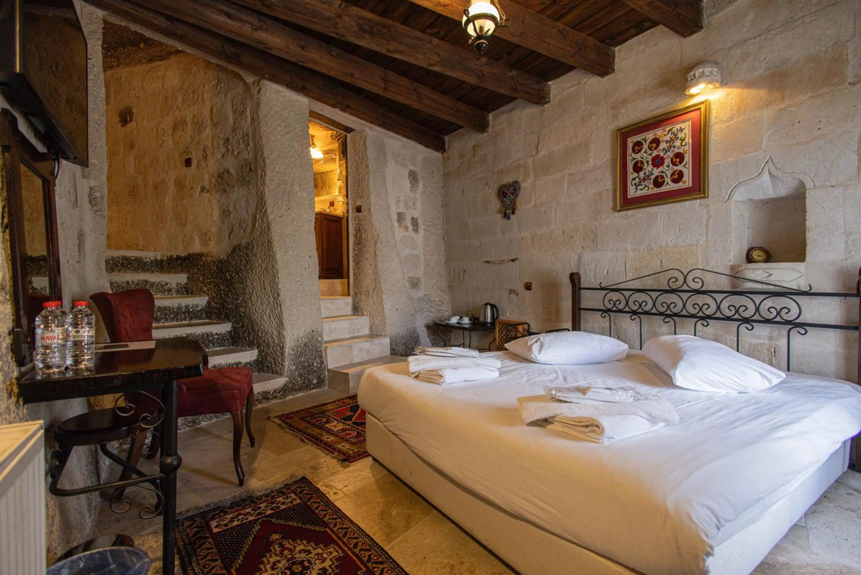 Bed in Century Cave Hotel