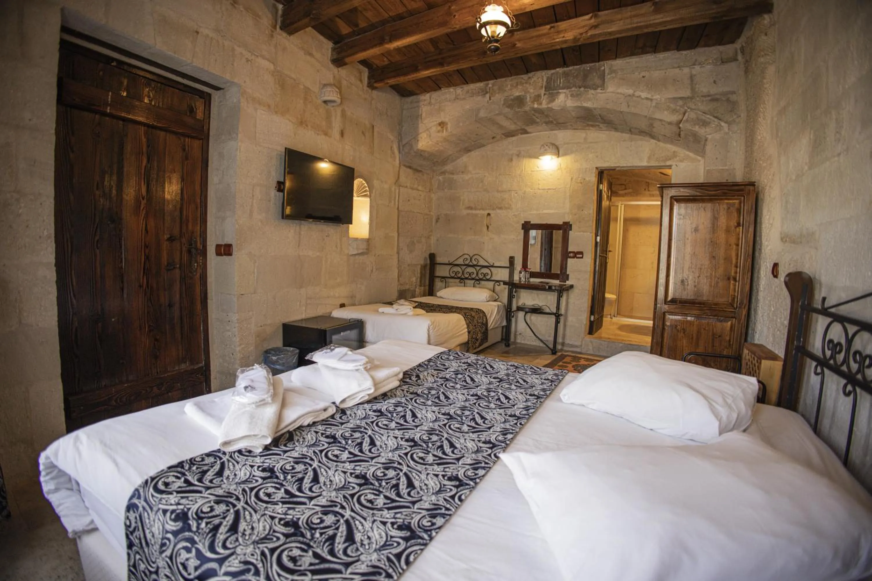 Bed in Century Cave Hotel