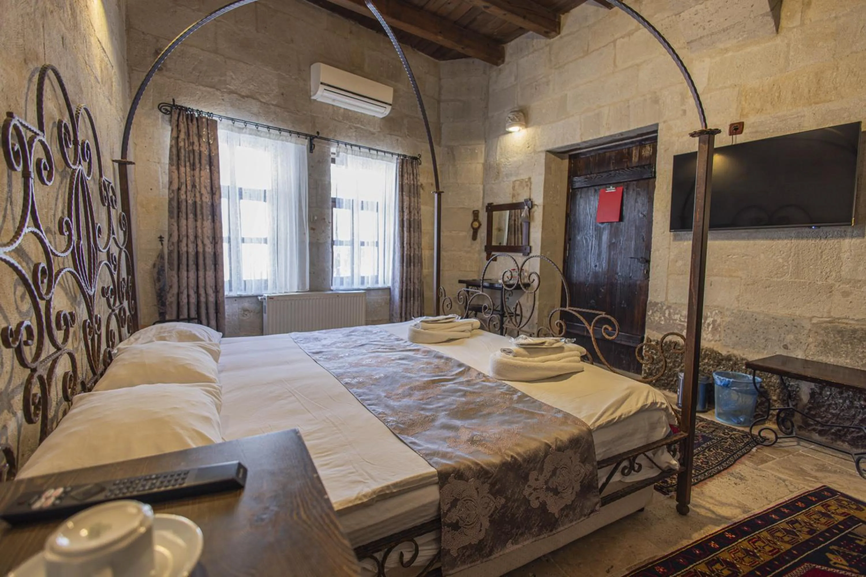 Bed in Century Cave Hotel