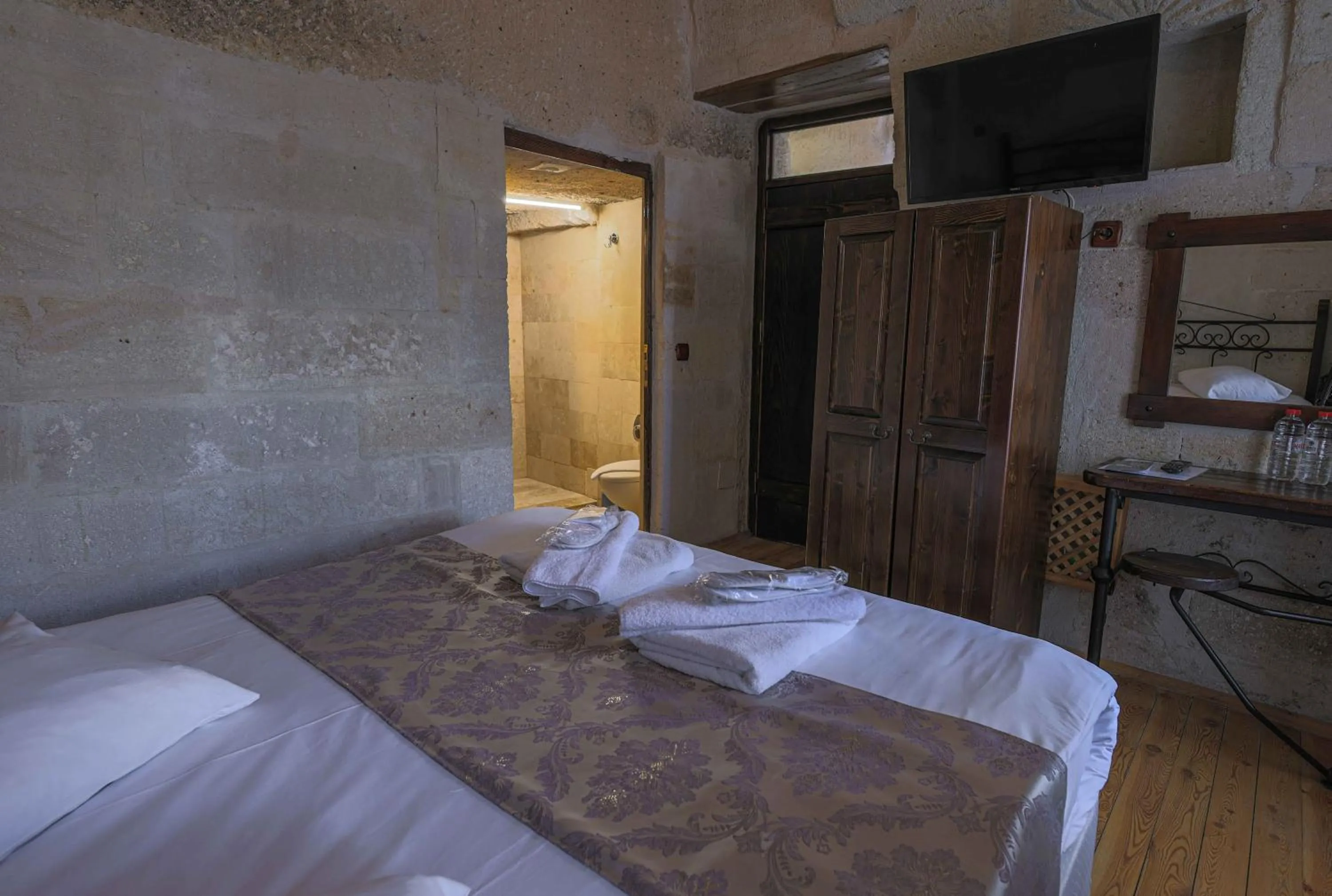 Bed in Century Cave Hotel