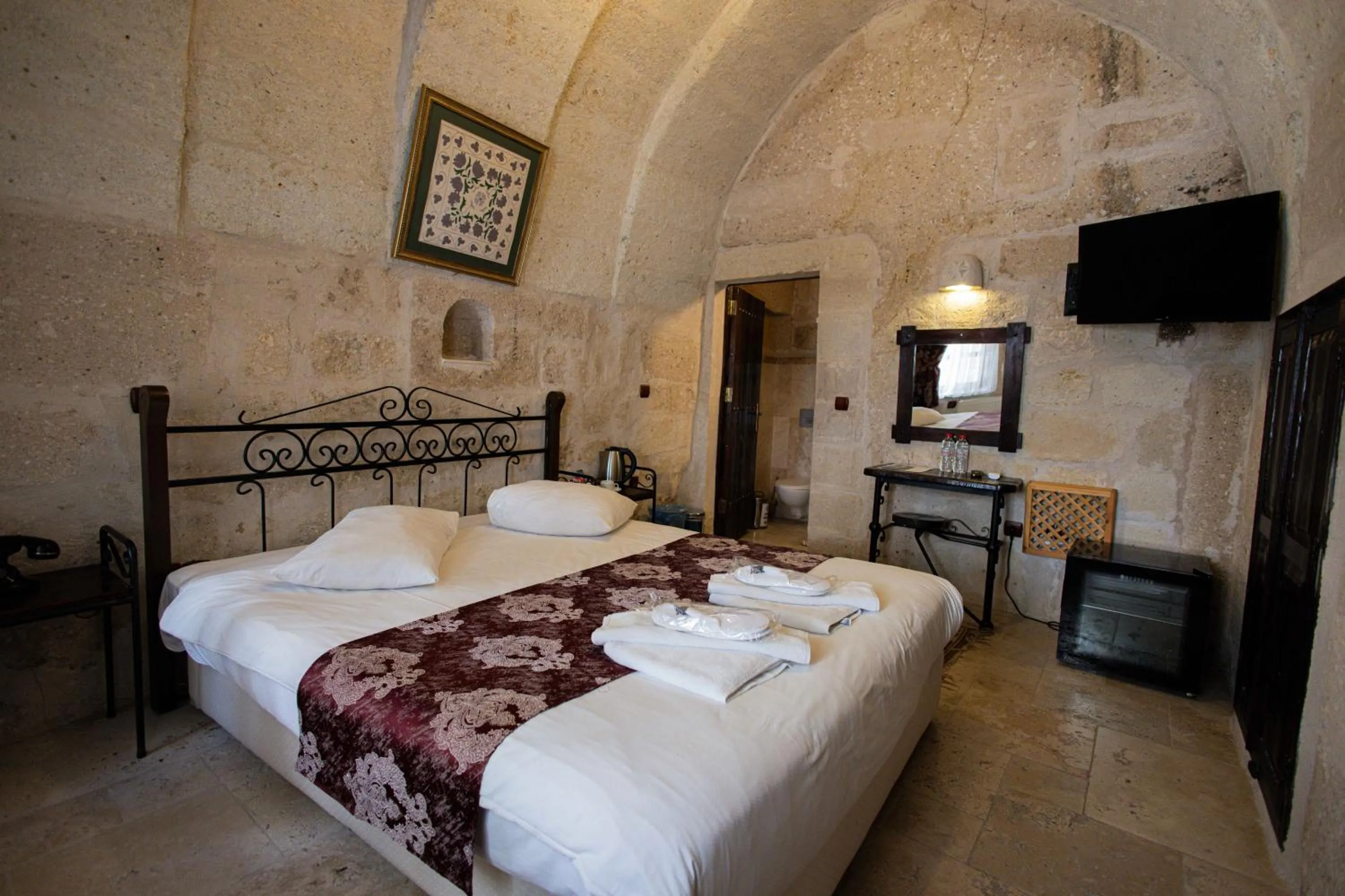 Bed in Century Cave Hotel