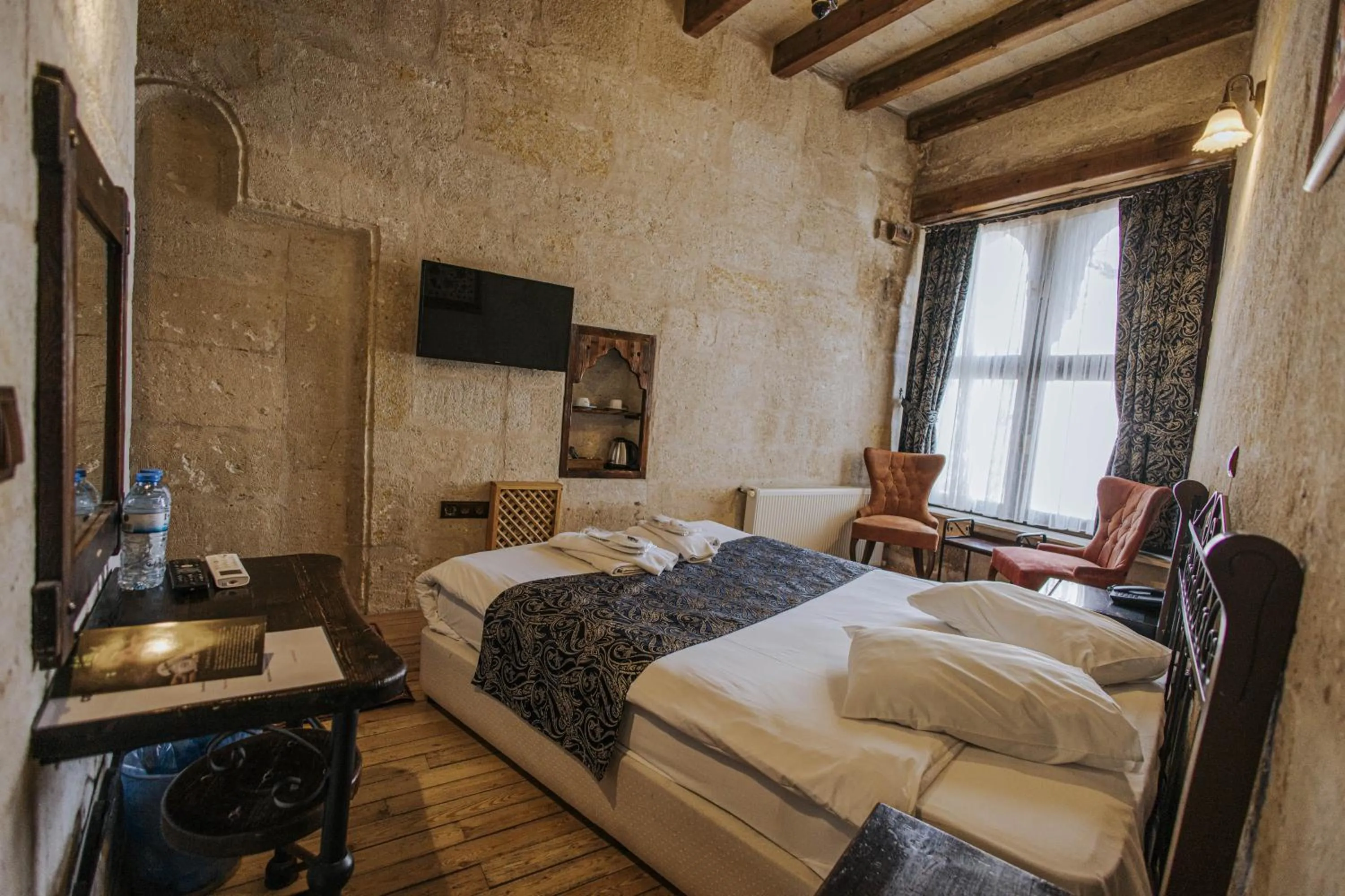 Bed in Century Cave Hotel