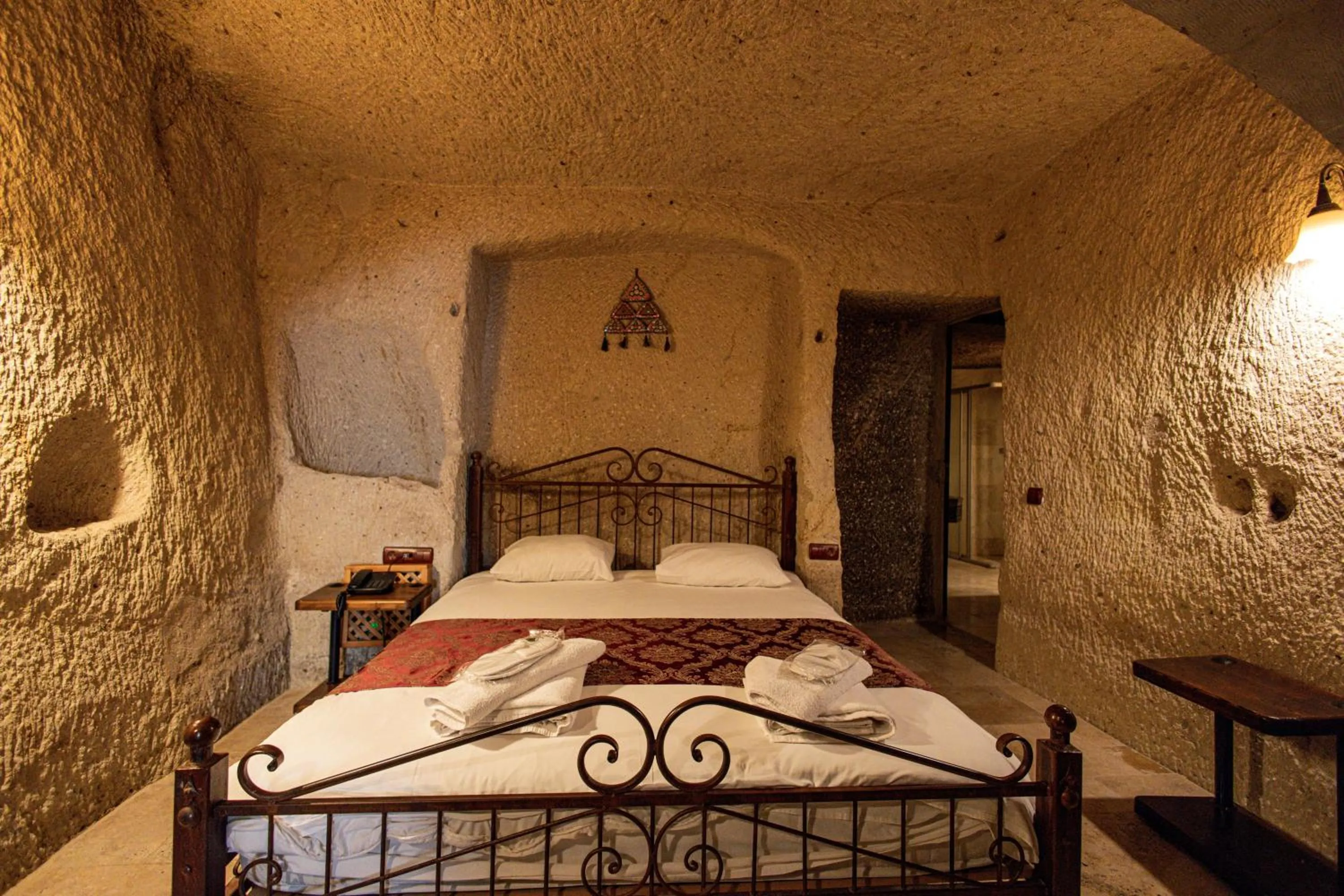 Bed in Century Cave Hotel