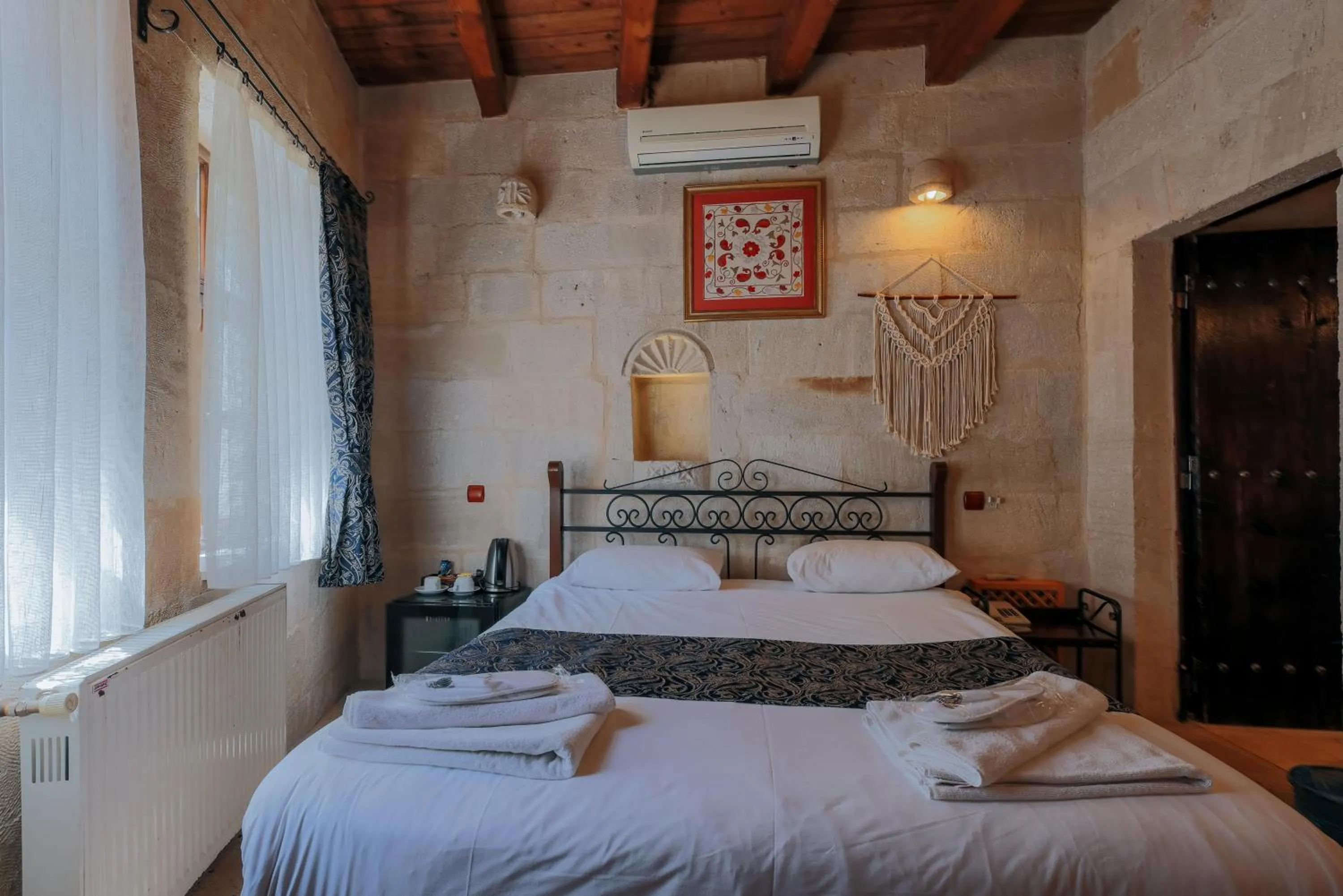 Bed in Century Cave Hotel