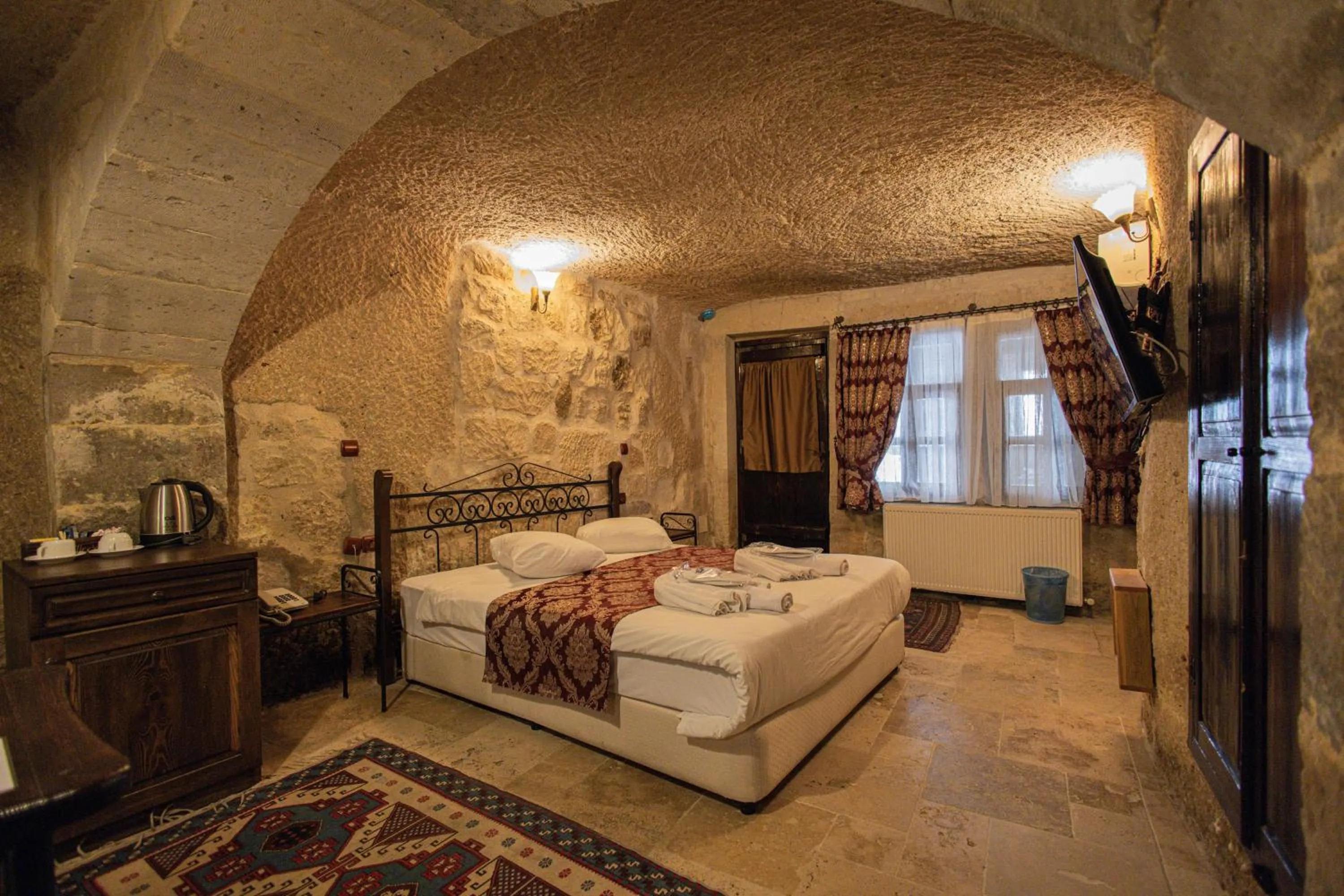 Bed in Century Cave Hotel
