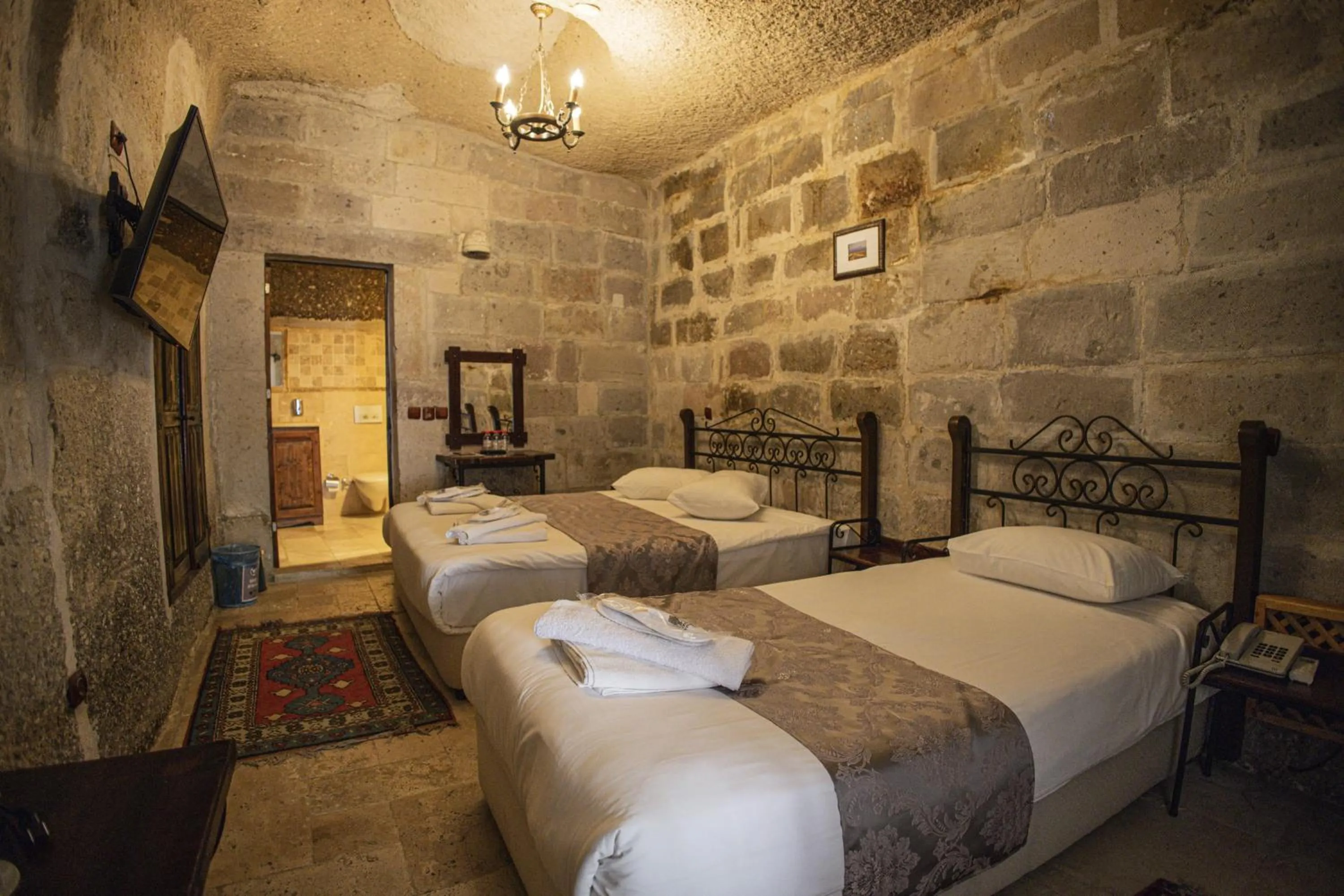 Bed in Century Cave Hotel
