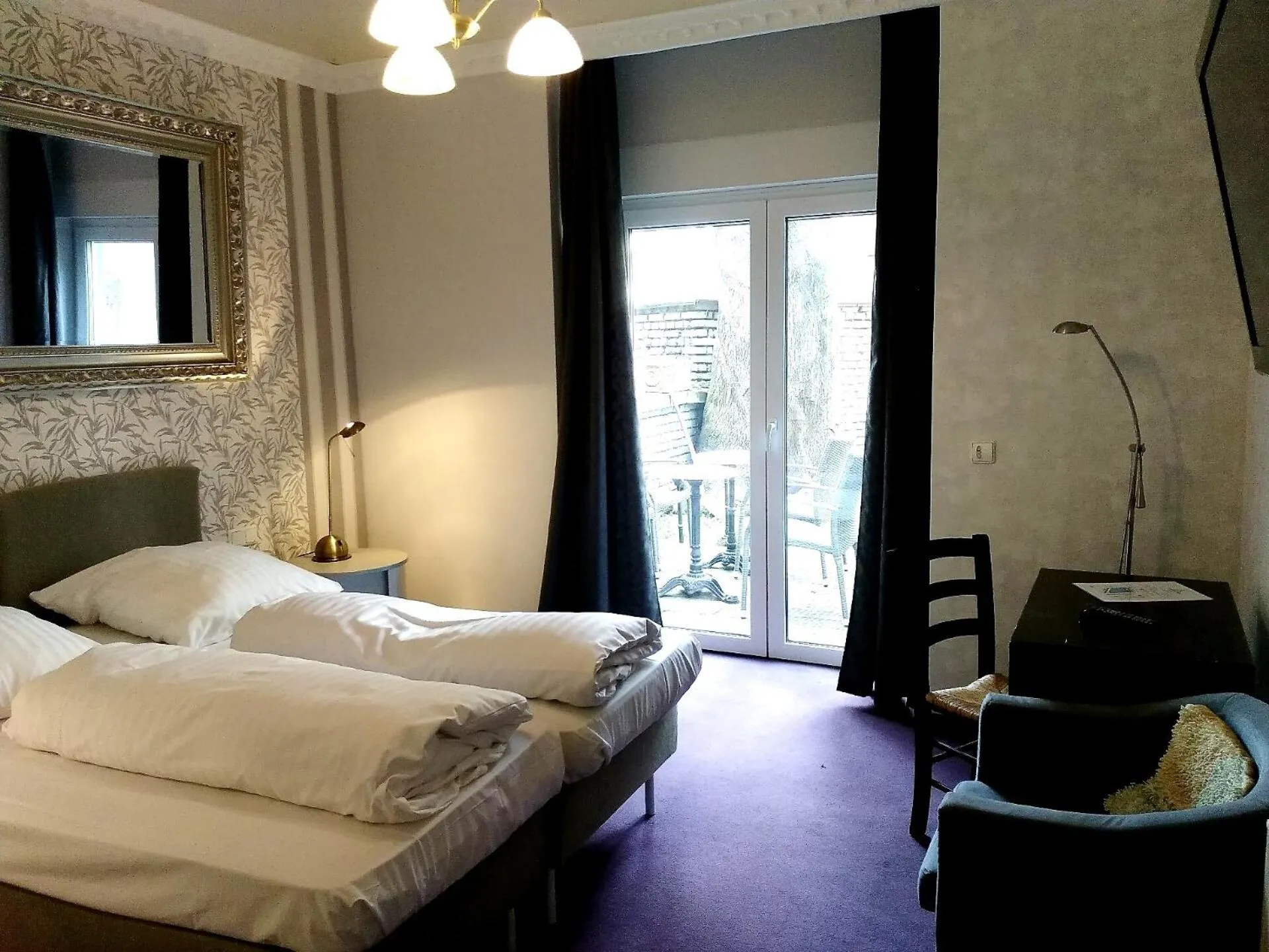 Photo of the whole room, Bed in Wasserturm Hotel Mannheim