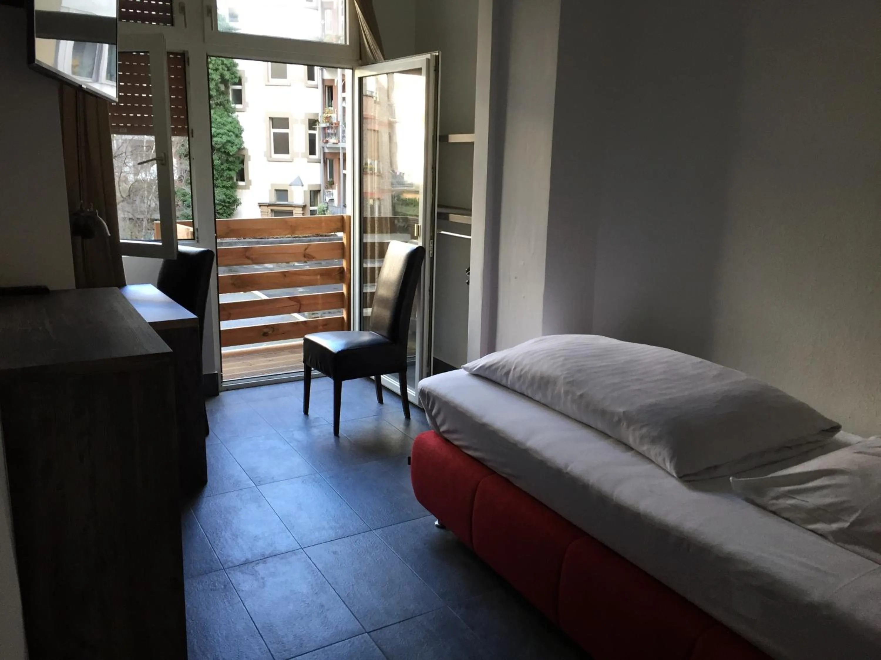 Photo of the whole room, Bed in Wasserturm Hotel Mannheim