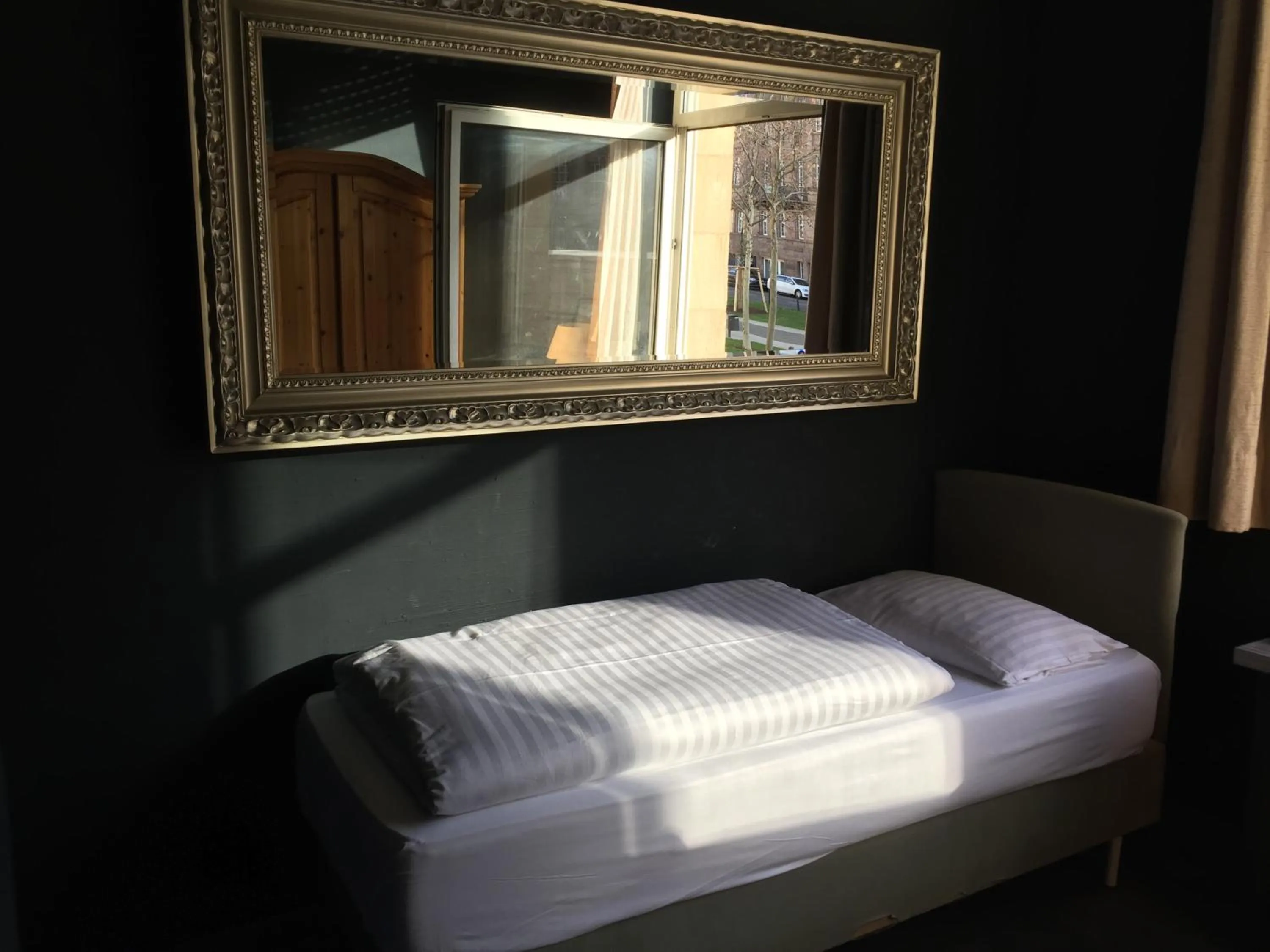 Photo of the whole room, Bed in Wasserturm Hotel Mannheim