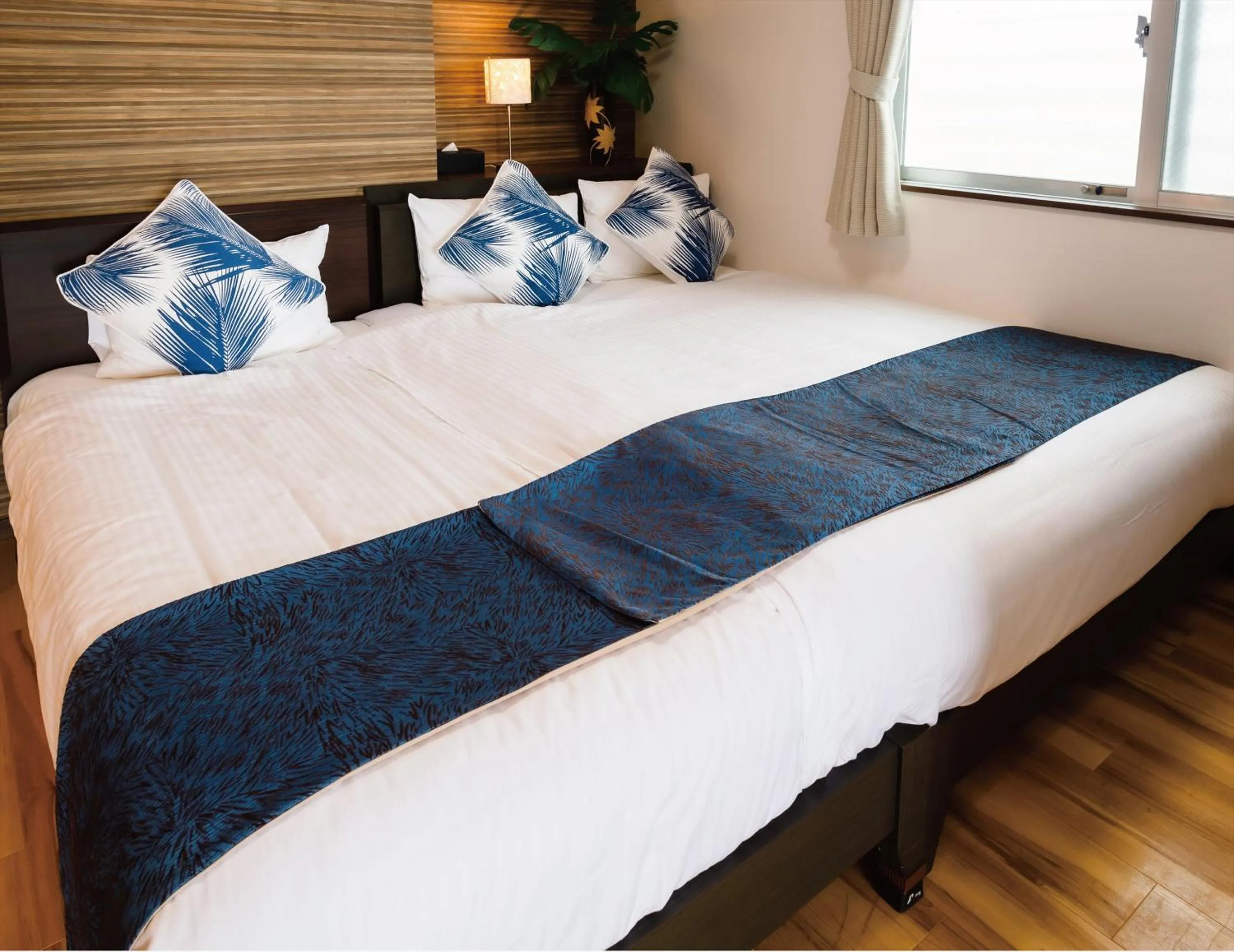 Bed in Zoe Resort The Sunset Village Okinawa Chatan