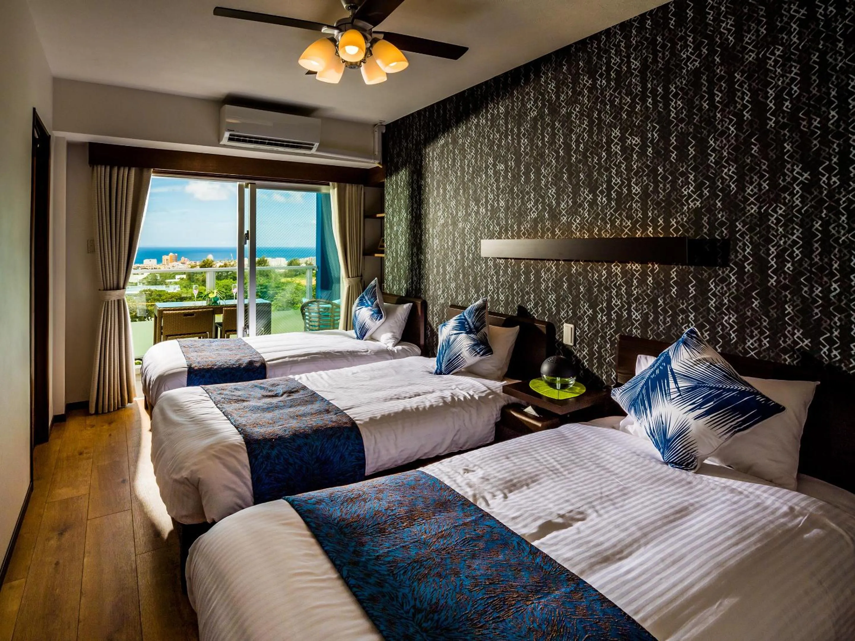 Bedroom, Bed in Zoe Resort The Sunset Village Okinawa Chatan