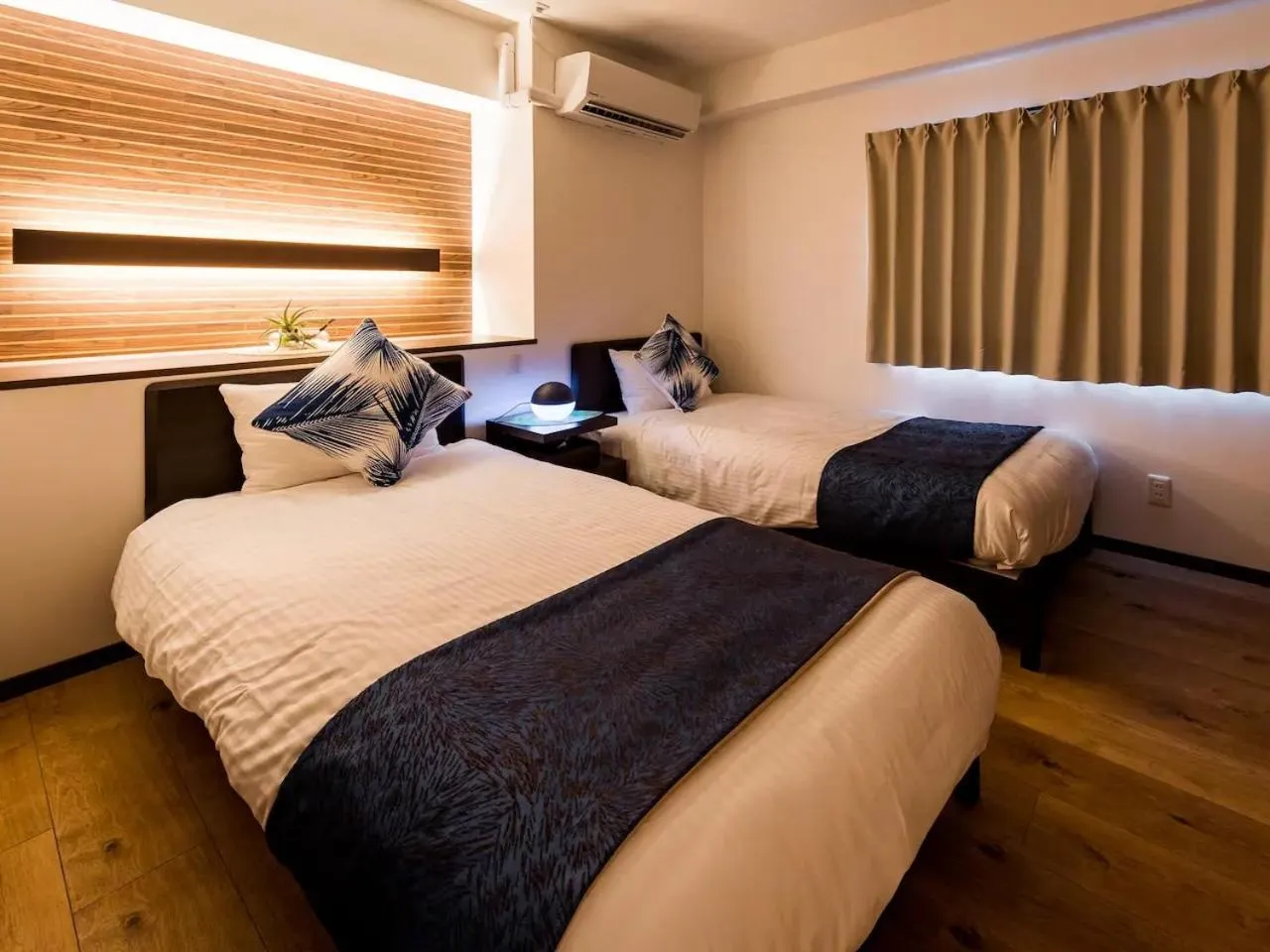 Bedroom, Bed in Zoe Resort The Sunset Village Okinawa Chatan