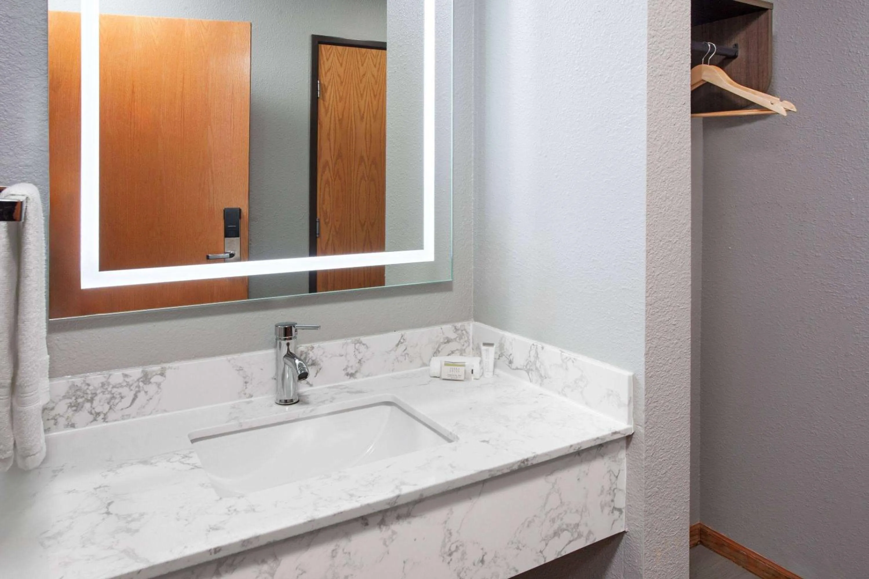 Bathroom in Super 8 by Wyndham McHenry Fox Lake Area