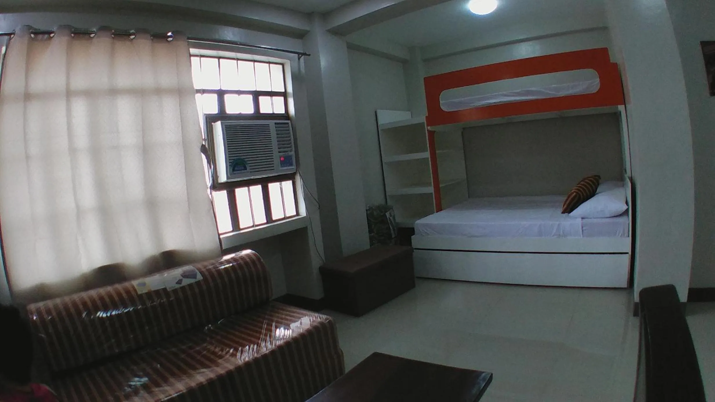 Living room, Bed in Beinte Singko de Marso Apartments