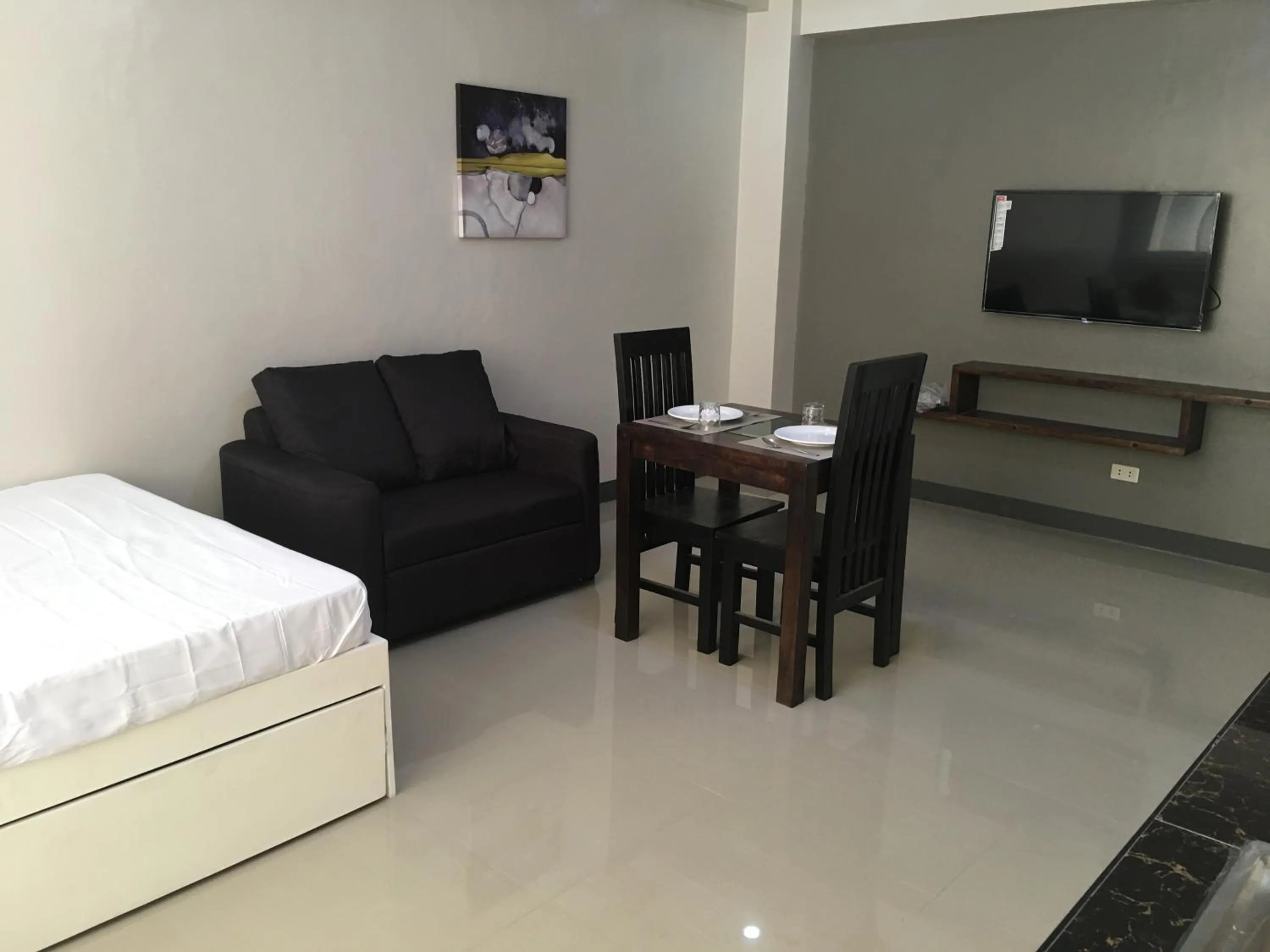 TV and multimedia in Beinte Singko de Marso Apartments