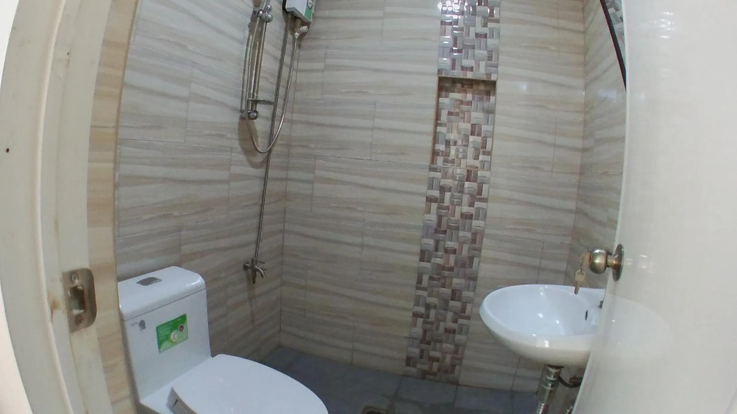 Bathroom in Beinte Singko de Marso Apartments