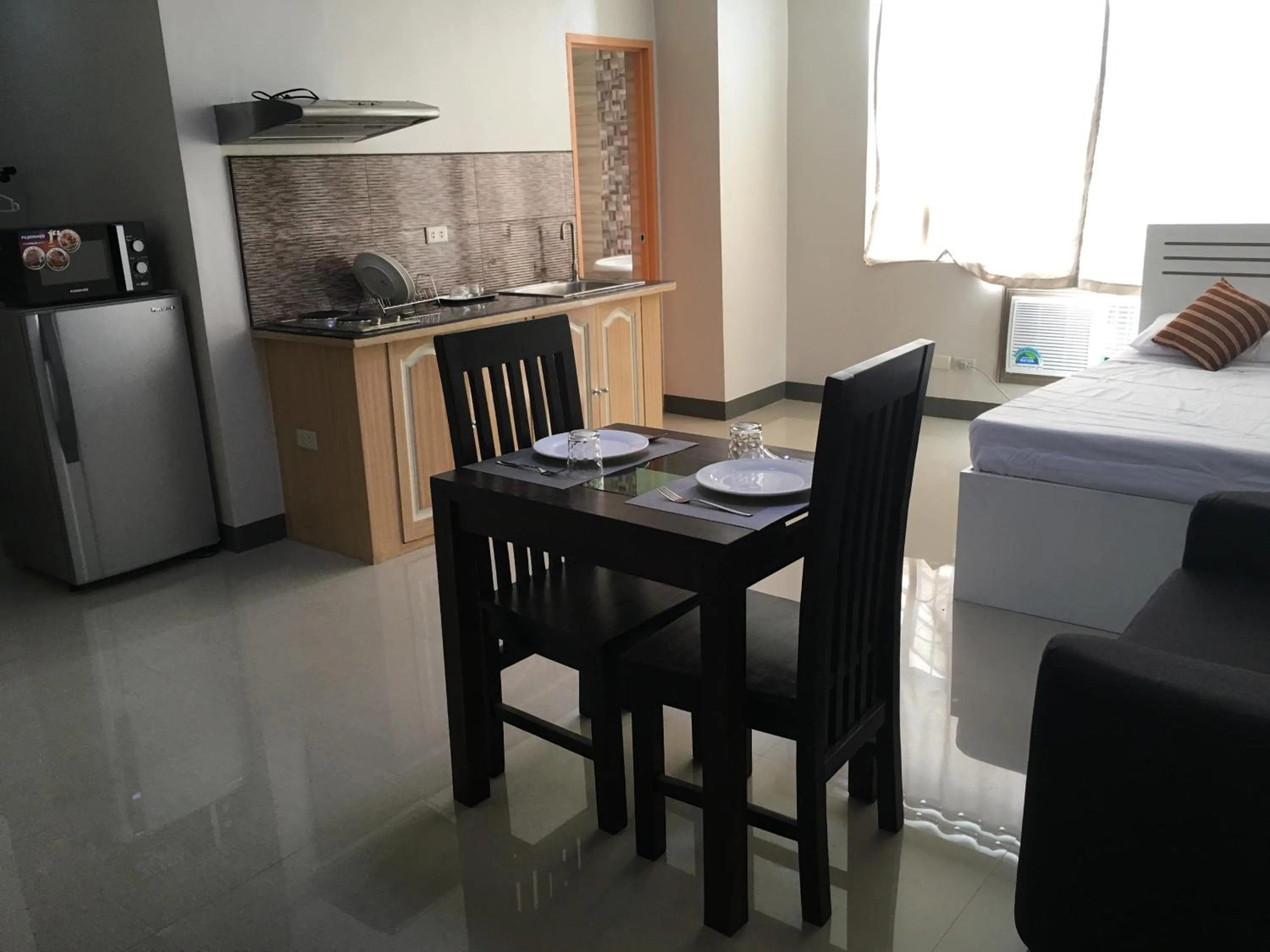 Dining area in Beinte Singko de Marso Apartments