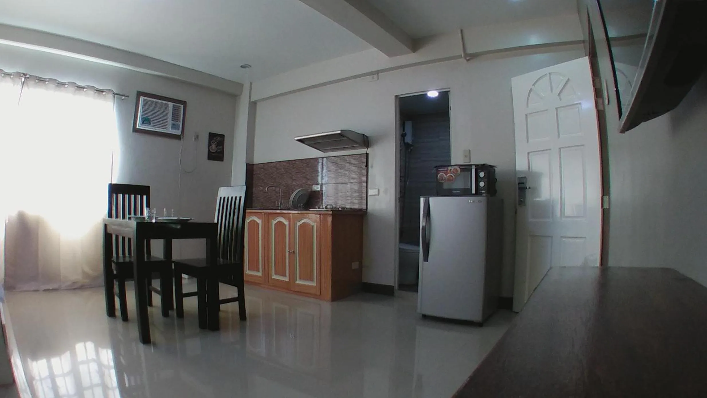Dining area in Beinte Singko de Marso Apartments